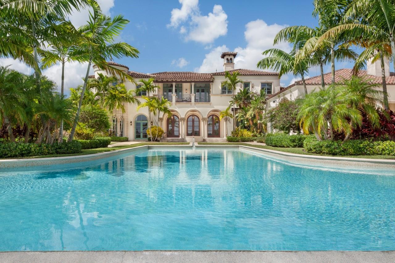 Lakefront views stretch far and wide from this sprawling compound on 2.5± lushly landscaped acres with fountains and water features.  Overlooking the lake, three beautiful loggias include a fireplace and full summer kitchen.  Stone and grass terraces surround the immense infinity pool and spa by the lakefront lawns. Exquisite stone, hardwood, and hand-painted finishes fill this impressive residence totaling 18,872± square feet with ten bedrooms and ten and a-half baths including the guest houses.  Features include five garage bays, impact-glass windows, a generator, Crestron electronics, and an elevator.  The fine furnishings are also available.
Offered furnished for $8,590,000 excluding personal items, computers and two family room couches. DISCLAIMER: The written and verbal information provided including but not limited to prices, measurements, square footages, lot sizes, calculations and statistics have been obtained and conveyed from third parties such as the applicable Multiple Listing Service, public records as well as other sources. All information including that produced by the Sellers or Listing Company are subject to errors, omissions or changes without notice and should be independently verified by any prospect for the purchase of a Property.  The Sellers and Listing Company expressly disclaim any warranty or representation regarding all information.  Prospective purchasers' use of this or any written and verbal information is acknowledgement of this disclaimer and that Prospects shall perform their own due diligence.  Prospective purchasers shall not rely on any written or verbal information provided when entering into a contract for sale and purchase.  Some affiliations may not be applicable to certain geographic areas. If your property is currently listed, please do not consider this a solicitation.   In the event a Buyer defaults, no commission will be paid to either Broker on the Deposits retained by the Seller. "No Commissions Paid until Title Passes."    Buyer pays title insurance, Florida documentary stamps, and all other closing costs for New Construction and land use. Copyright 2016 Listing Company.  All Rights Reserved.