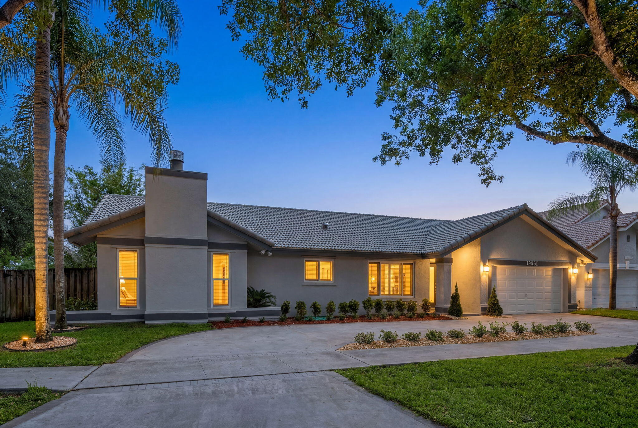 Stunning single-story 3BR/2.5BA home in Cooper City's premier Rock Creek neighborhood. Fully updated in 2020 with a beautifully renovated chef's kitchen and modernized bathrooms. This 2,321 sq ft layout boasts soaring vaulted ceilings, formal living/dining rooms, & oversized family room complete with a cozy fireplace. French doors lead to a large covered patio & fully fenced backyard. Spacious master suite features dual walk-in closets, en-suite bath, and private garden. Highlights include large kitchen pantry, laundry room, plantation shutters, new impact windows & doors, large garage, landscaping and a circular driveway. Unbeatable location zoned for A-rated schools: Embassy Creek Elementary, Pioneer Middle, and Cooper City High. Walking distance to local parks and community amenities. Come prepared to make competitive offer. Very few turn-key properties are available in this highly desirable neighborhood and school district.
