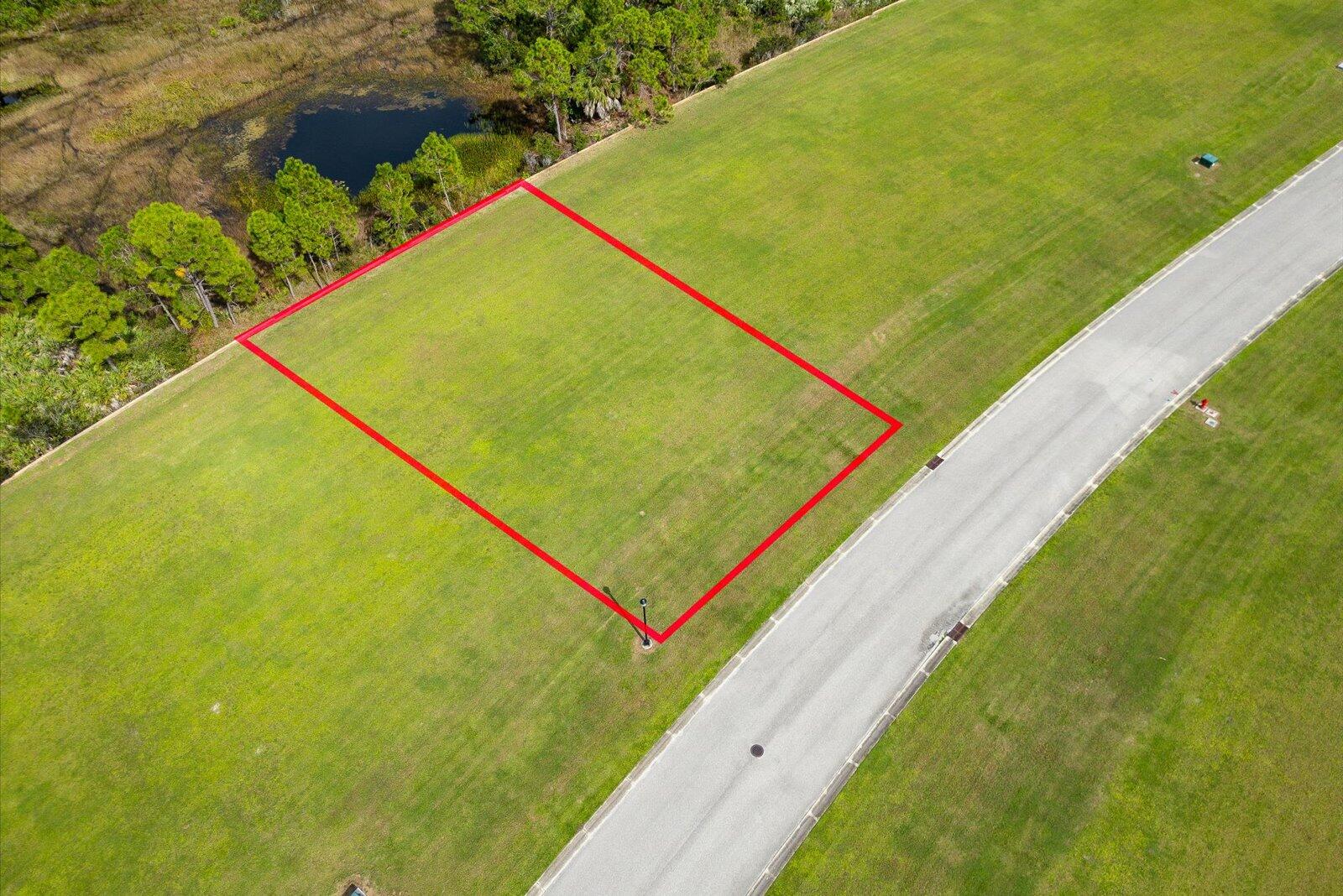 Located within the Tesoro Club, the premier gated golf community on the Treasure Coast, is this private building site. Bordering a forest that features pines, cabbage palms, and ponds, this preserve measures over a mile long. Although there is no requirement to begin construction, the new owner may select from Tesoro's approved builder list. The Tesoro building guidelines allow several exterior designs heralded by today's designers. With ownership of this homesite, membership in the Tesoro Golf Club is optional. Tesoro is a guarded gated community with 24-hour roving security, so an appointment is required to view the building site.