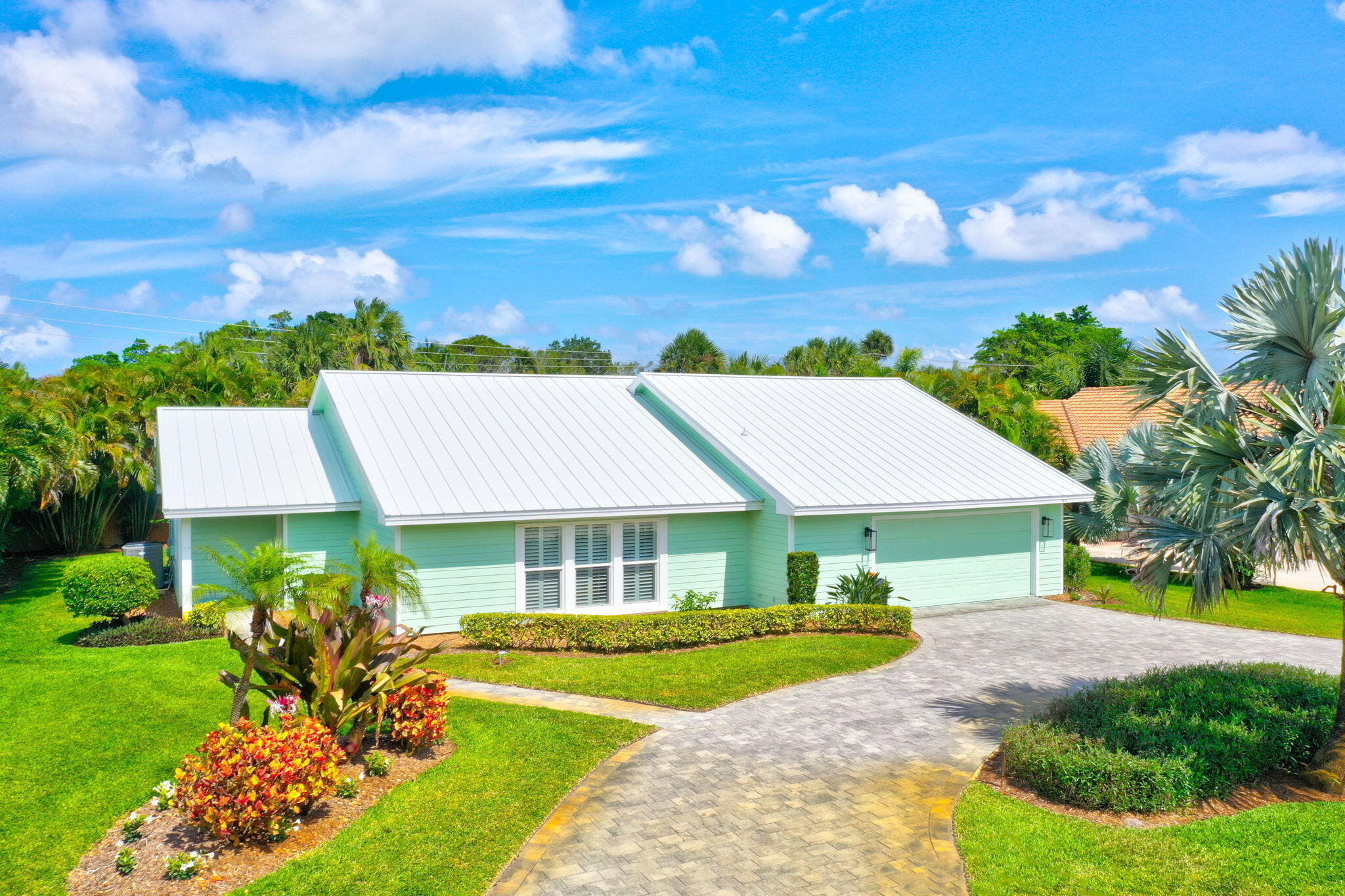 Welcome to this charming 3-bedroom, 2-bathroom single-family residence in the Yacht & Country Club of Stuart community. This home offers 2,051 square feet of finished living space across one story, providing comfortable and accessible floor plan living and beautiful pool to enjoy with an expanded patio area. The property features a 2.5-car garage, offering ample space for vehicles and storage needs. Located in Stuart, Florida, this residence presents an excellent opportunity for those seeking a thoughtfully designed home in an established community setting. Whether you are looking for a short-term rental to enjoy your Florida stay or while performing your area search or needing a great home to rest your head while building or renovating your existing home this is it!