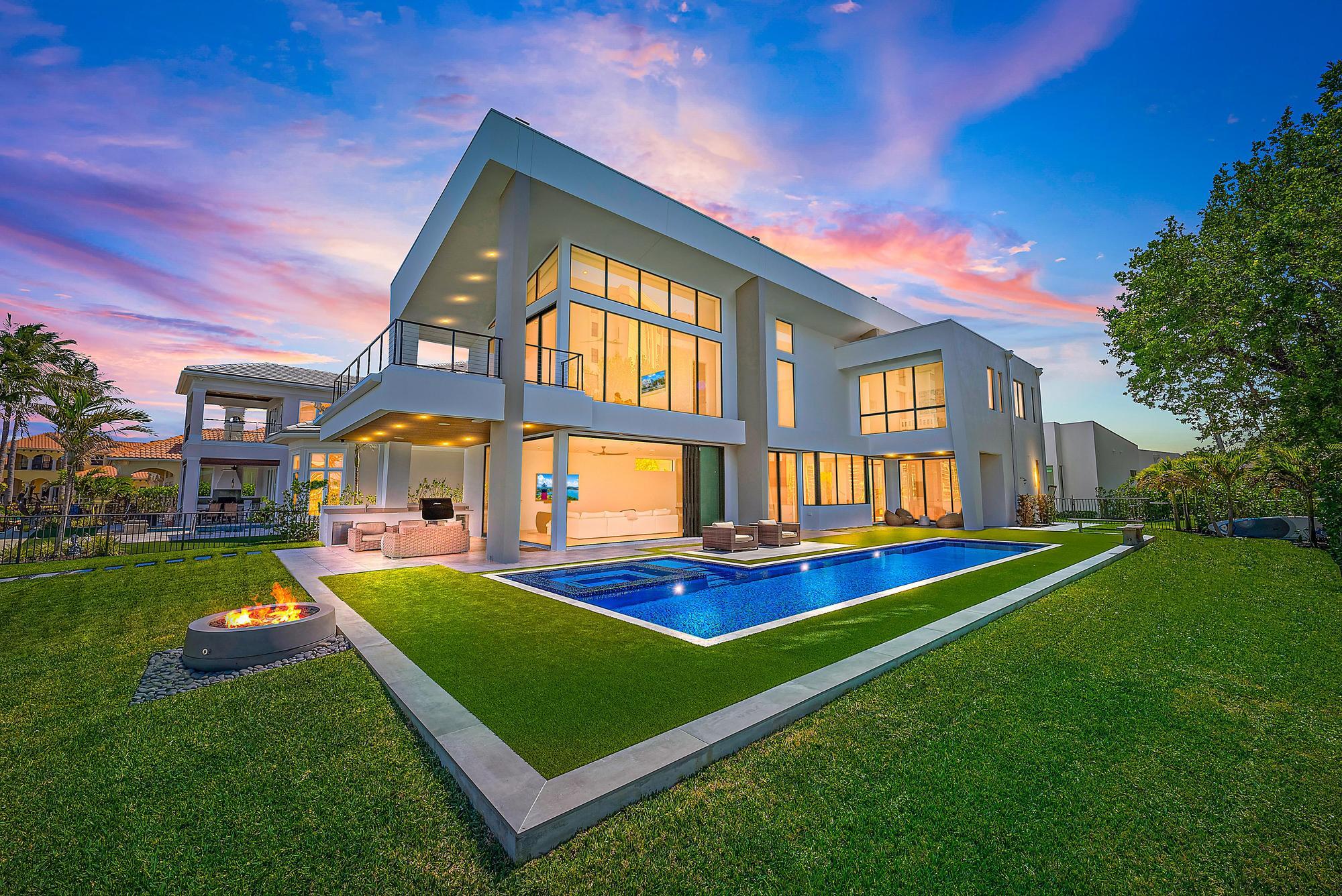 JUPITER'S MOST EXTRAORDINARY GEM IS FINALLY AVAILABLE!
This exceptional residence is situated on .5 acre & approximately 180ft of stunning Bahama blue waterways directly on the Jupiter Intracoastal, featuring the nation's most epic views of the legendary Jupiter Island. Recently developed by renowned Rothrock Construction & esteemed Affiniti Architects, this property offers a perfect combo of timeless sophistication & warmth. Located in a private enclave of Jupiter with a friendly neighborhood feel & NO HOA! Enjoy the true essence of Florida Living with the open floor plan complete with intracoastal views & ocean breezes from virtually every angle. 
This elite estate features 7,700 TSF designed with a main house 4 BD/4 BA & separate guest house with 1 BD/1 BA & kitchen (5BD total). Connect with friends & family in the stunning custom kitchen which boasts elite appliances, premium gas stove, & an oversized Cambria kitchen island perfect for culinary adventures & lively conversations. 
Purposely built minutes from the iconic Jupiter Inlet, this home truly encompasses the dream of boating enthusiasts. Additionally, the property boasts a new dock & deep water for your boating needs, enjoy the northern sandbar a quick swim away, perfect for family fun together while spotting manatees & sea turtles.
Take a dip in the oversized lap pool, surrounded by both turf and natural grass. Relax  chatting around the firepit or rinse off after a swim in the private outdoor shower.
Created with superior finishes throughout including new sea wall, Timbertech dock & Neptune lift. Enjoy extensive upgrades including wide plank oak wood flooring, imported Porcelanosa porcelain tiles, Emtek hardware as well as a steadfast poured concrete throughout the second floor. Detailed internals featuring Sonos, Lutron shades, full house H5 KW generator, water filtration, air purification, & a Zipwater hydrotap, security system with cameras & pre wired driveway gate.
This Jupiter residence epitomizes a clean, timeless elegance.
A breath of fresh air the moment you step through the front door & a privilege to call home.
Don't miss out. Connect for your private showing today!