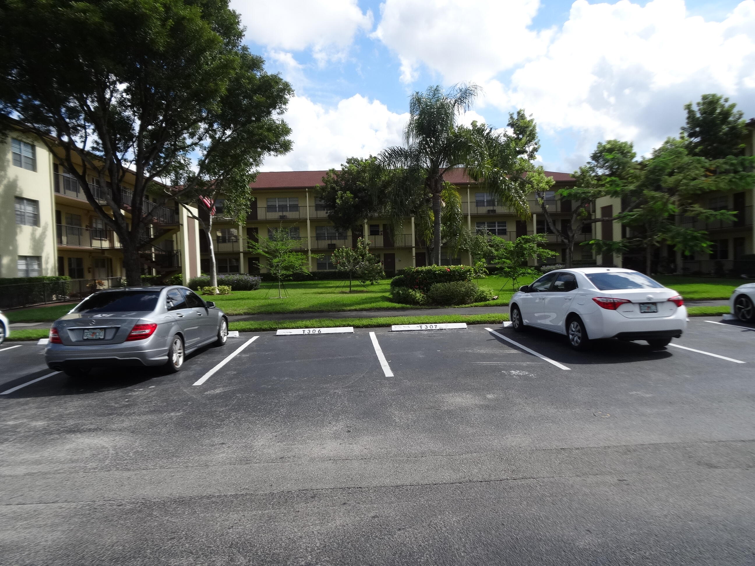 This 2 bedrooms 1 1/2 Baths unit comes furnished it has a large walking closet in the 2nd bedroom with a very nice screened balcony overlooking the garden. This walk-up garden-style building is located in the premier community of Century Village