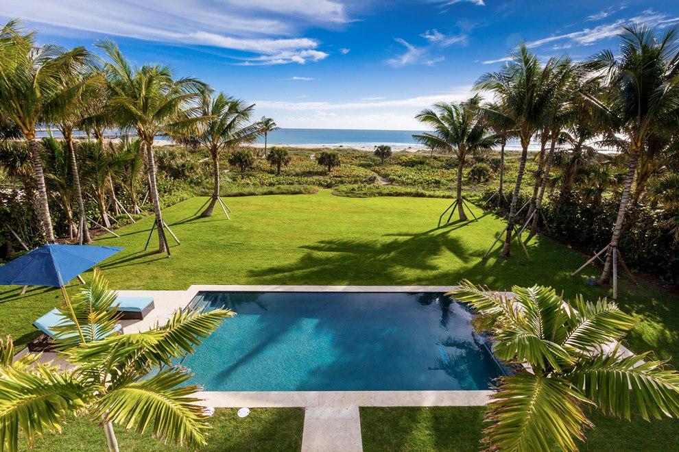 Rare & Spectacular 2.5+ Acres Direct Oceanfront on the North End Dunes with deep sandy beach. Furnished Grand Manor Home w/5BR/6Ba & stand-alone 4BR/4Ba guest house. Large proportion rooms, high ceilings, 1st & 2nd floor master suites, game room, club room & pub, media room, gym, wine storage & enoteca, east & west facing pools, outdoor kitchen, elevator, generator. 12+ car garage.