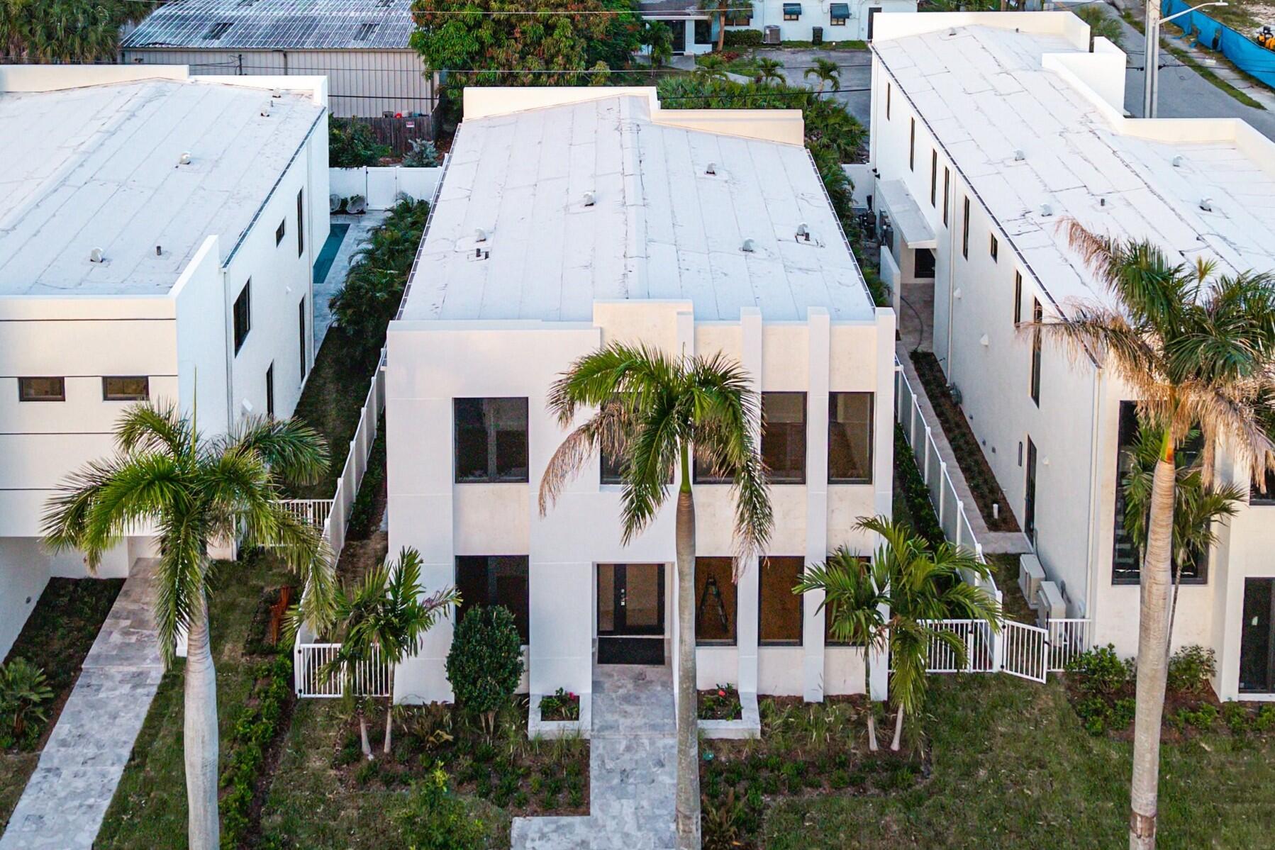 Brand new! Just completed. Modern perfection near Downtown Delray Beach built by reputable local developer Edgewater GC. This stunning home has 4 bedrooms, 4.5 bathrooms, a 2 car garage and a salt water pool and spa. There are extensive high-end finishes, impact windows and doors, real hardwood floors throughout, custom lighting, 8 inch baseboards, linear diffusers and gorgeous cabinetry. The gourmet chef's kitchen boasts Thermador appliances including a six burner natural gas rangetop, a wall oven, a speed oven/microwave, and an 48'' French door refrigerator with freezer drawers. The covered stone patio features an inlaid wood ceiling. Prime location near the white sand beach and a short stroll to Downtown Delray. You can live your best Floridian dream lifestyle in the heart of paradise. There are three new homes that were just built on adjacent properties 725, 731 and 735 SE 4th Avenue with 735 being on the south corner. Each is similar in style with different floor plans. They were just completed in July 2026. You can  also build custom on one of our two neighboring lots. All buyers obtaining financing are requested to please be cross qualified by the Seller's lender, Ryan Brandenburger at Cross Country Mortgage. If this property contracts and goes pending with no contingencies and terminates or expires for any reason other than a breach by Sellers, the Earnest Money Deposit shall be retained by Sellers and Corcoran Group as liquidated damages, and all parties shall be released from further liability. Buyers agent shall not receive any share of the retained deposits or payment from the Seller.