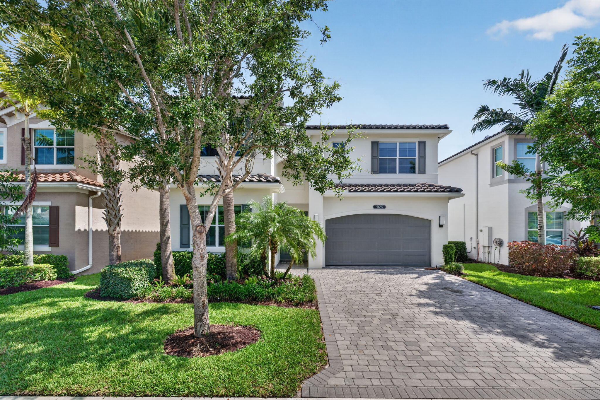 This beautifully designed two-story home offers the perfect blend of comfort, style, and functionality. The open-concept floor plan features a spacious first-floor primary suite with a custom walk-in closet, providing privacy and convenience, along with a dedicated office ideal for working from home or as a flexible living space. Upstairs, you'll find three additional bedrooms and two full bathrooms, creating a comfortable layout with space for everyone. Thoughtful upgrades include no carpet throughout the home and custom cabinetry in the laundry room, adding both style and functionality. Enjoy all that Dakota has to offer, including a resort-style clubhouse, pool, fitness center, tennis and pickleball courts, indoor sports courts, playground, and scenic walking paths.  Conveniently located near shopping, dining, and everything Delray Beach has to offer, this is South Florida living!