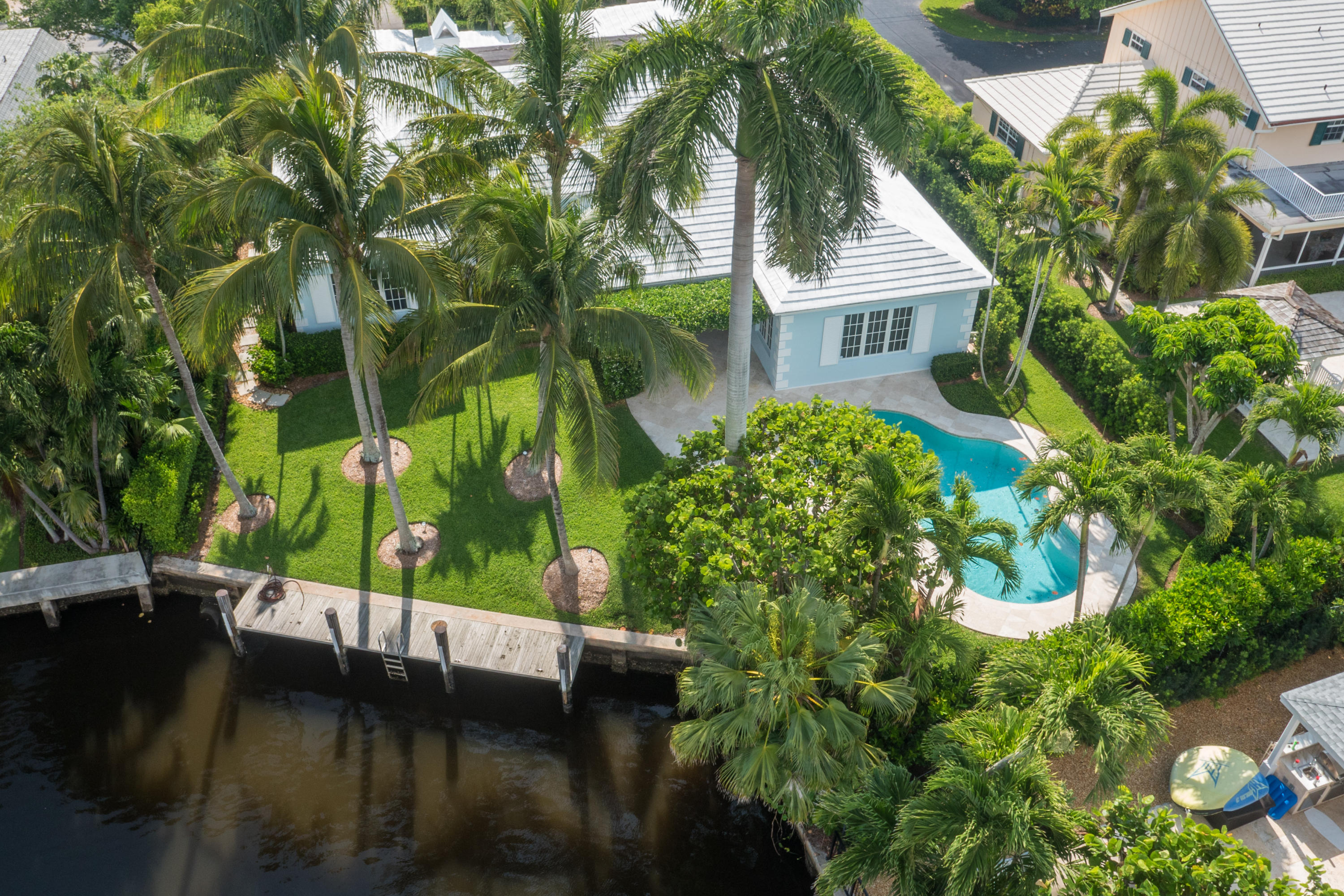 Nothing has been overlooked in this fully remodeled and designed waterfront home.  Brought to perfection by renowned Seaside Builders, this residence with direct intracoastal views and private dock has been custom built for the most discerning of owners. Attention to detail is apparent from the fixtures, to flooring and magnificent designer touches throughout. 
Offering an excellent floor plan with stunning views, an exceptional chef's kitchen opening to the spacious family room and loggia and a gracious private master suite with den.  
With tropical gardens and pool, this loggia is perfectly positioned for living, entertaining and enjoying spectacular sunset views.  
Situated in Gulf Stream's most sought after neighborhood, offers the best of opportunities!