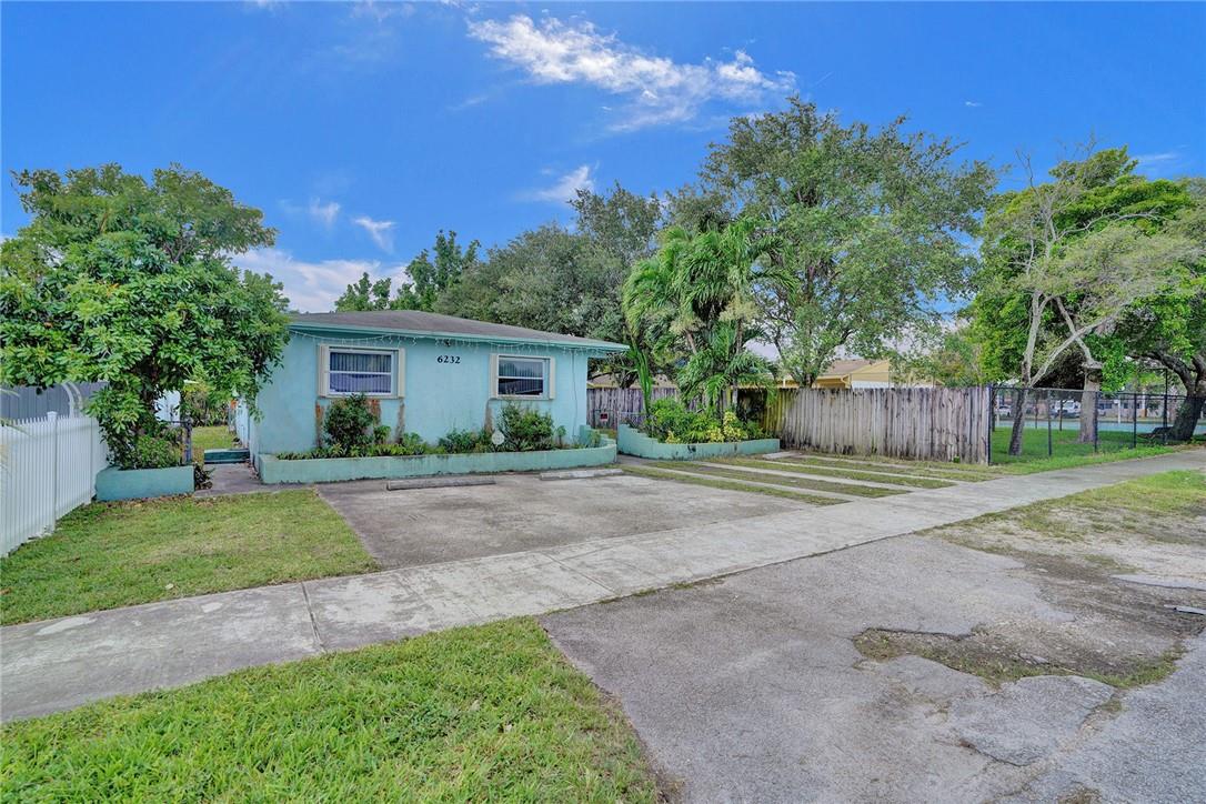 No more renting! Own this affordable gem with 3 beds/2 baths for under $400K. Enjoy tile floors in living areas, and replace the bedroom carpet to suit your taste. Plenty of parking spaces in front and expansive fenced backyard is perfect for your kids or pets. Located a few blocks from Walmart, Aldis, popular dining spots, major roads, and only a few miles drive to Hard Rock Hotel & Casino. While the property could benefit from some updating and a fresh coat of paint, it has a lot of potential. With a little love and personalization, you'll transform this house into a perfect home or a lucrative investment property.Don't delay your dreams any longer, seize this opportunity to call Hollywood your home. Contact us today to make this charming property your very own! HIGHEST AND BEST OFFER TO BE SUBMITTED BY 5PM THURSDAY (06/15/23)