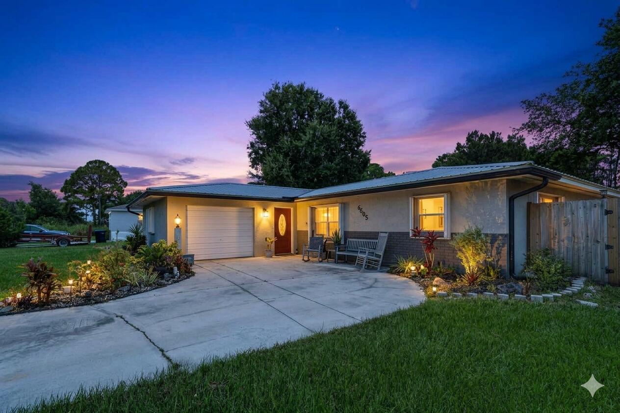 4 Bedroom  (1 has separate in-law entrance), 2 Bathroom, Concrete block home with metal roof, and hurricane accordion shutters on an oversized 90x130 .27acre lot.  Beautifully updated kitchen and bathrooms,  NEW AC 2025, Gutters 2025, Big 16x21 Screened patio. Long Driveway can accommodate many cars or a boat.  RV setup with electric, water and sewer connections in back yard, Close to I-95 for easy commute.  Lakewood Park is a Voluntary POA with a laid back vibe close to Vero Beach.  Flood Zone X (no flood insurance required)