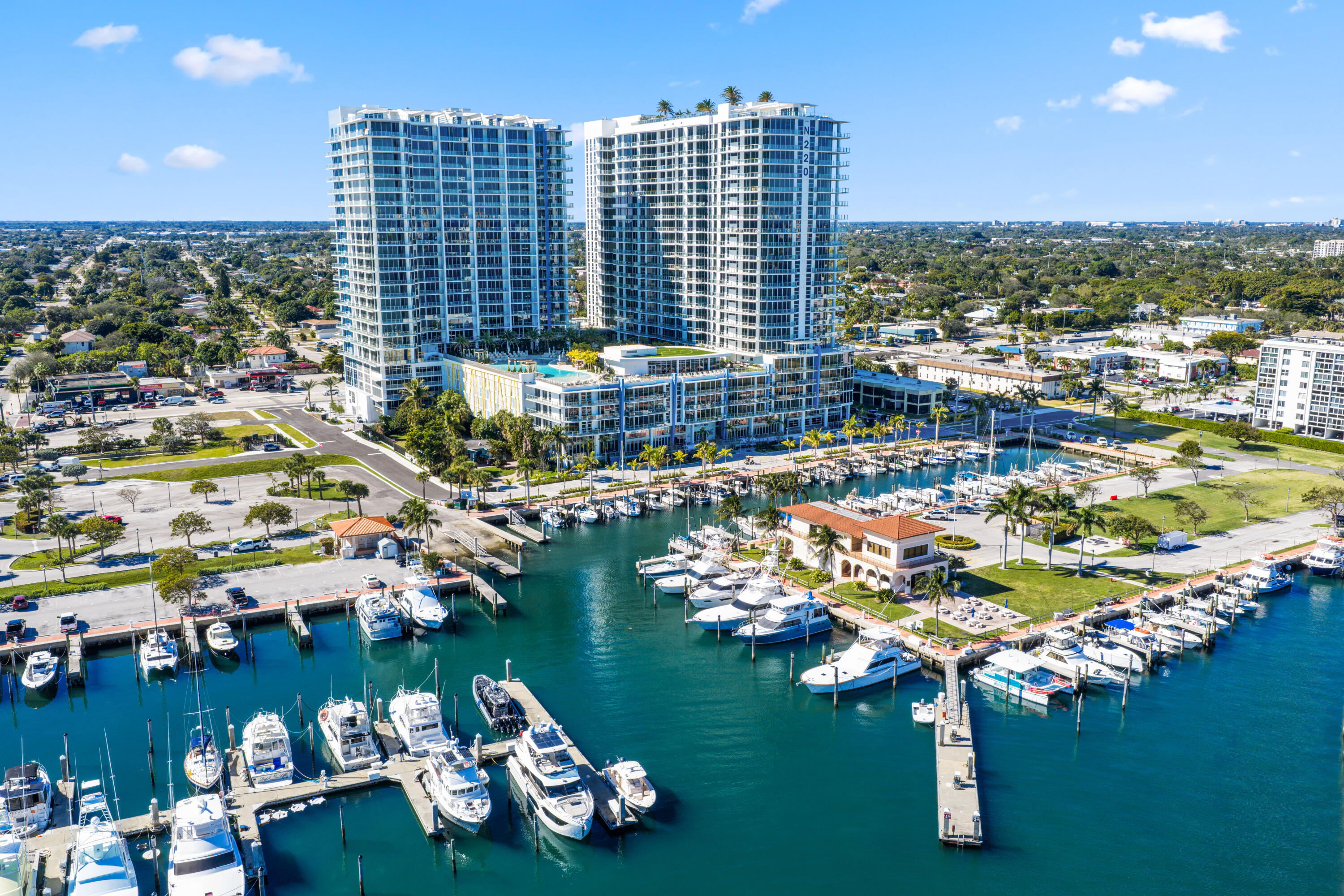 NEW One-Bedroom 1.5 Bathroom(s) on 11th floor at Nautilus 220 (N220) with corner wrap-around terrace on the Northwest portion of the development. Exquisite water, sunrise, and sunset views. This brand-new residence has an assigned parking space. Features: Washer/Dryer (side by side), floor-to-ceiling hurricane impact windows/sliders, 10' ceilings, Miele appliances, European porcelain tile/cabinetry, quartz countertops, walk-in closets, glass enclosed shower(s), soaking tub, frontlit mirrors, and dual vanity.  6th floor pool deck w/ resort-style pool, firepit stations, jacuzzi/spa, grill stations, resident pavilion, dog park/wash station, and putting green. Rooftop lap pool. Club Room, event space, guest suites, conference rooms, gym, spin/yoga studios, sauna, steam room, locker rooms, massage room, bowling alley/lounge, gaming tables, theater, golf simulator, music room, kids' playroom, and teen room. Celebrity Chef David Burke's waterfront restaurants: Seahawk Prime and Birdie Bar & Grill and Café/Market to come. Live the luxury lifestyle in the Palm Beaches at this exquisite waterfront oasis, with amenities galore and incomparable water views! This property is full-service resort-style with valet/self/assigned parking, vehicle charging stations, five-story parking garage, onsite concierge and  property management, security, mailroom, package porter, beach access and parking on Singer Island, and bike/paddleboard storage. Live the luxury lifestyle at this waterfront oasis, with amenities galore and incomparable water views! Beautiful design, artwork, expanding neighborhood, investment opp!