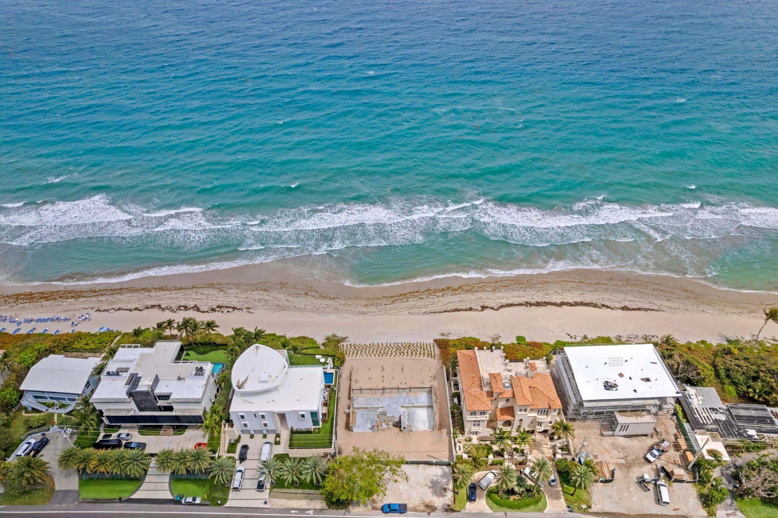 Bypass the standard 24-month DEP and FDOT permitting delay and begin vertical construction immediately on South Ocean Boulevard. This is the ultimate "Speed-to-Market" solution for a legacy 100-linear-foot direct Atlantic frontage estate. This asset is delivered fully de-risked with all complex coastal infrastructure already in place. The site is "out of the ground" with certified auger cast pilings, poured grade beams, and a secured lower-level slab. The purchase includes the fee-simple land, a full Benedict Bullock architectural package ($90M+ finished asset pedigree), and all active, transferable permits (Town of Highland Beach, FDOT, and FL DEP/CCCL). Designed as a 3-story contemporary masterpiece, the plans feature 8,154 SF of air-conditioned living space 10,656 total SF - (see more) 5 bedrooms, 8.2 baths, an oceanfront pool with a waterfall feature, and an expansive 717 SF rooftop deck. Parking is optimized for 4-8 vehicles via an enclosed 4-car garage with lift options. Property is being sold as a construction-ready project. The most time-intensive engineering and approval phases are finished, allowing the purchaser to step directly into the vertical build-out. Included: Land, Approved Plans, Transferable Permits, and Completed Foundation/Grade Beams. | Vertical construction and all interior/exterior finishes are the responsibility of the buyer.