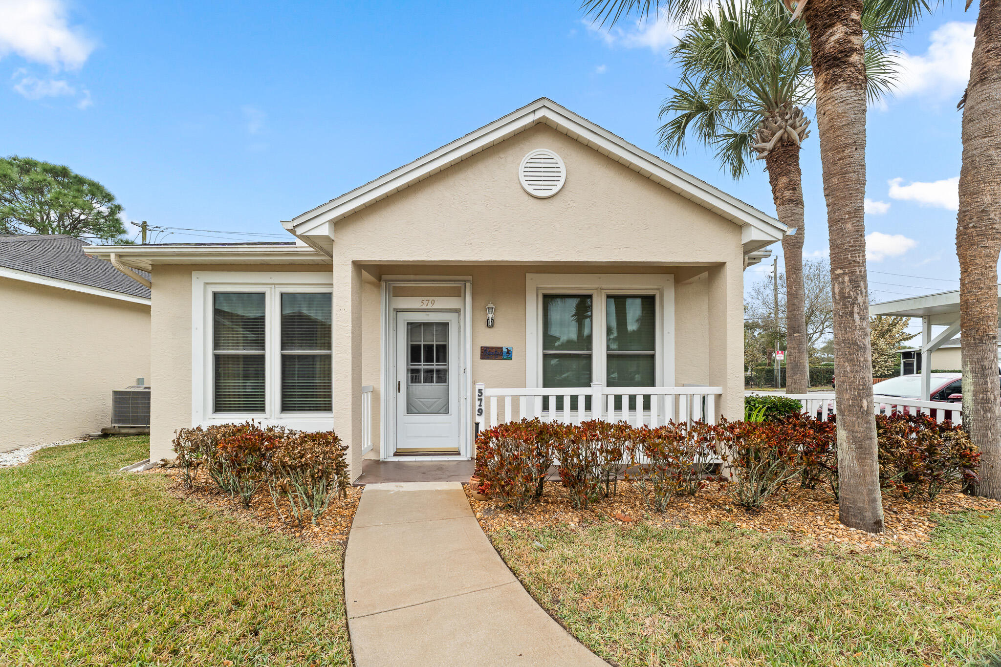 Welcome to easy, resort-style living in this charming villa located in the desirable 55+ gated community of Kings Isle in St. Lucie West. Enjoy indoor-outdoor living with a screened-in porch perfect for morning coffee or evening relaxation. Kings Isle offers a country club lifestyle with a beautifully appointed clubhouse and a resort-style pool. Ideally located in the heart of St. Lucie West, you are minutes from shopping, dining, top medical facilities, and everyday conveniences, with quick access to I-95. Just a short drive to New York Mets Spring Training, this home is perfectly positioned for seasonal enjoyment or year-round living. Low-maintenance Florida living at its best.
