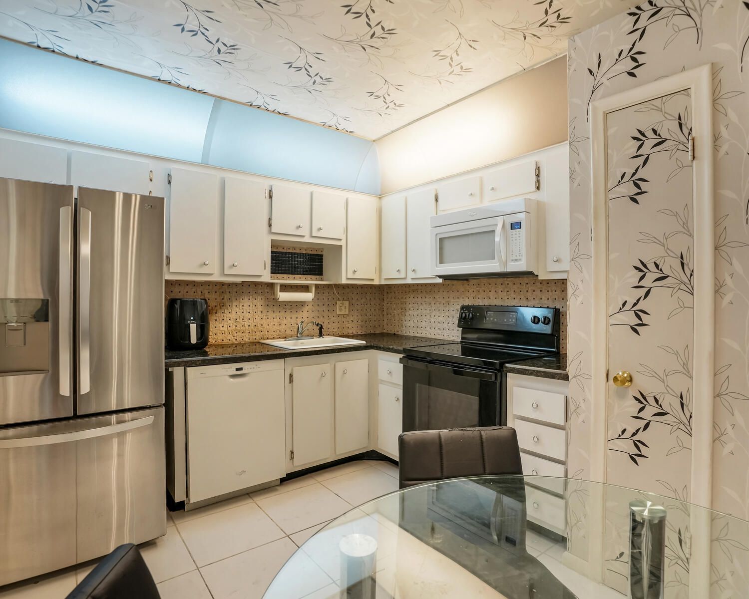 1/1 Condo in 55+ Castle Gardens, Building 12 This blank canvas is perfect for buyers seeking a personal touch. Features newer vanity and appliances, carpeted flooring, and a walk-in closet. A comfortable, simple layout ready for your upgrades. AC 2024, Water heater 2016. Come see this special home today and make it your own.