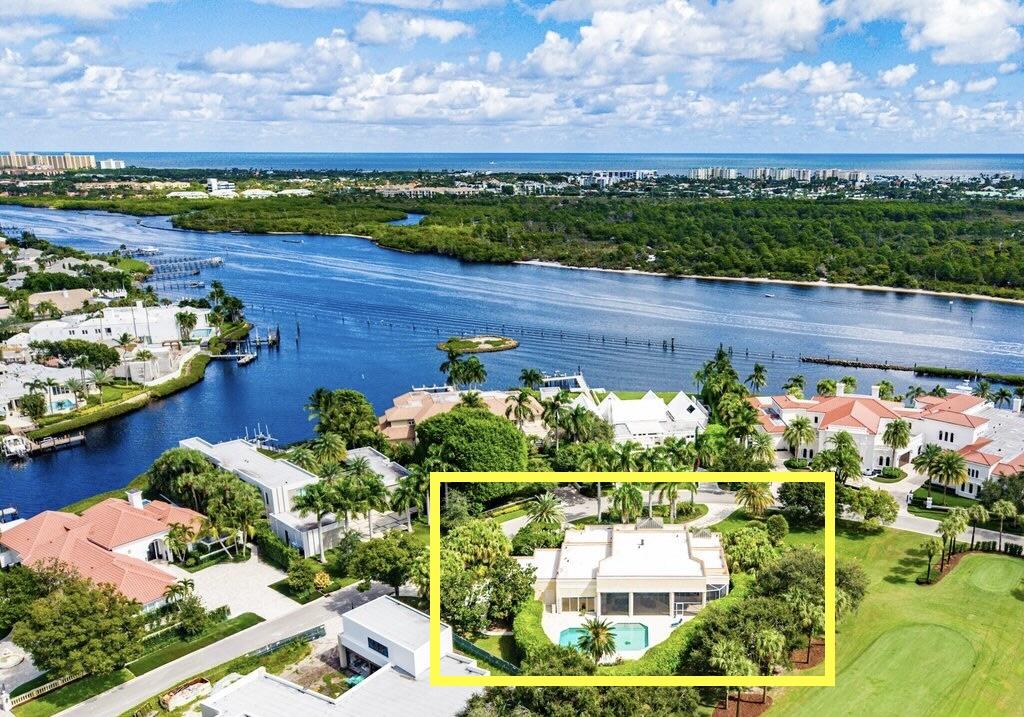 Exceptional opportunity in Admirals Cove! Situated on a rare .65-acre golf course lot along prestigious Spyglass Lane, this single-story CBS home offers 4,393 sf under air & over 6,100 total sf. High ceilings, open living areas, large kitchen, and expansive master suite overlook sweeping fairway views. Screened patio, pool, and lush landscaping create serene outdoor living. Ideal to enjoy as is, renovate, or rebuild a new estate potentially capturing Intracoastal views. Surrounded by new luxury homes and moments from the Club at Admirals Cove's exceptional amenities and activities. One or more interior and pool area photos of this property have been virtually staged for marketing purposes. Furnishings shown do not convey.  Buyers with a fully executed contract entered into before 11/1/25 will not have to pay the increase in the Club's nonrefundable initiation fee even if closing occurs on or after 11/1/25.  

Admirals Cove is the premier waterfront and club community in the Palm Beaches.  It's amenities are resort style in a friendly and relaxed atmosphere.  Activities for members are diverse, and include boating, golf, tennis, pickleball, year-round children's programs, photography, fishing, extensive group and individual wellness programs, yacht club, and a terrific variety of social events.   

Facilities and amenities include two stunningly designed clubhouses, tennis center, a full service marina, 45 holes of championship golf, golf indoor performance and training center, 9 Hydro tennis courts, 12 pickleball courts, state-of-art fitness center, spa, salon, boutique Waterside hotel for members and their guests, multiple dining venues ranging from waterfront casual dining to formal dining, on-site banking, card rooms, and conference rooms,