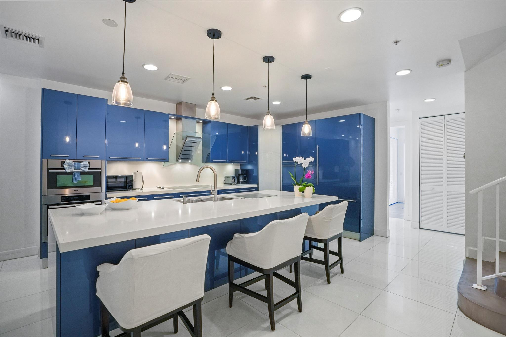 With recent nearby sales approaching $900/sqft, this property stands out as one of the most compelling values currently available just steps from the beach. This exceptional 5-bedroom, 4-bath coastal retreat offers the perfect blend of luxury, space, and flexibility. Featuring minimal HOA and no rental restrictions, it presents a rare opportunity for both short-term rental income and personal enjoyment. The interior showcases a sleek gourmet kitchen with Miele appliances, quartz countertops, impact windows, a private elevator, and a spacious 2-car garage. Generously sized bedrooms,  rooftop terrace with panoramic Intracoastal views, Jacuzzi-ready with connections already in place. Don't miss this prime beachside location, combining lifestyle, value, and strong investment potential.