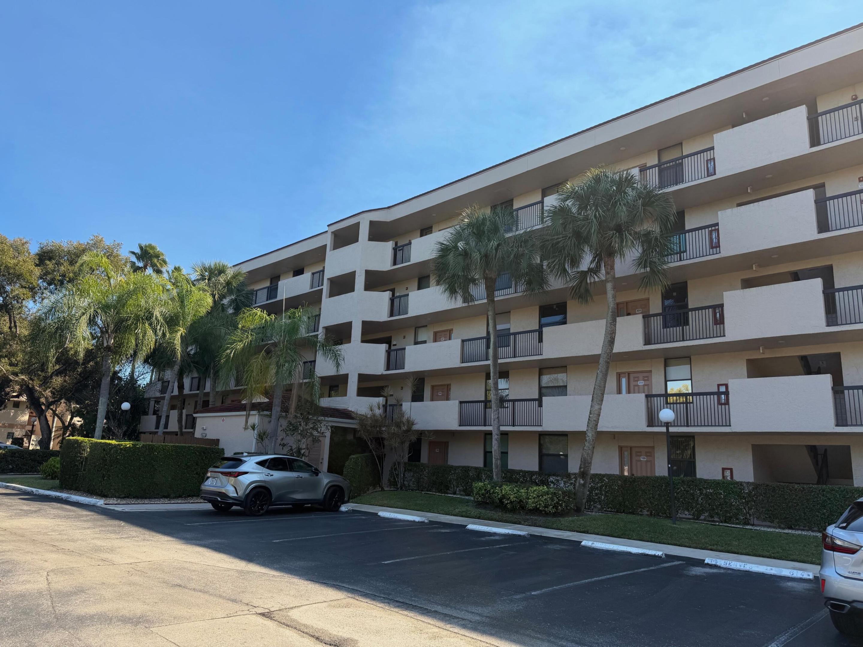Motivated seller. WHAT A VIEW!! Completely refreshed Penthouse condo, all ages, w/Tile floors in main living areas *Full size washer & dryer in large laundry room* Main living area includes a sitting room to enjoy the beautiful Lake and Preserve view. Morning Sunrise through the wall of windows. New carpet and freshly painted Primary suite with Walk in Shower* Walk in closet plus lots of other closets throughout this home* Good sized Guest bedroom and guest bath. Great parking Space directly in front of building* Easy walk to heated Community Pool and clubhouse* Township offers Olympic style swimming pool, Fitness center, Tennis courts, Walking Paths, Clubhouse w/ card rooms, workshop, Dance & exercise classes* Kids games & swim classes* Play areas* Easy to make your own.