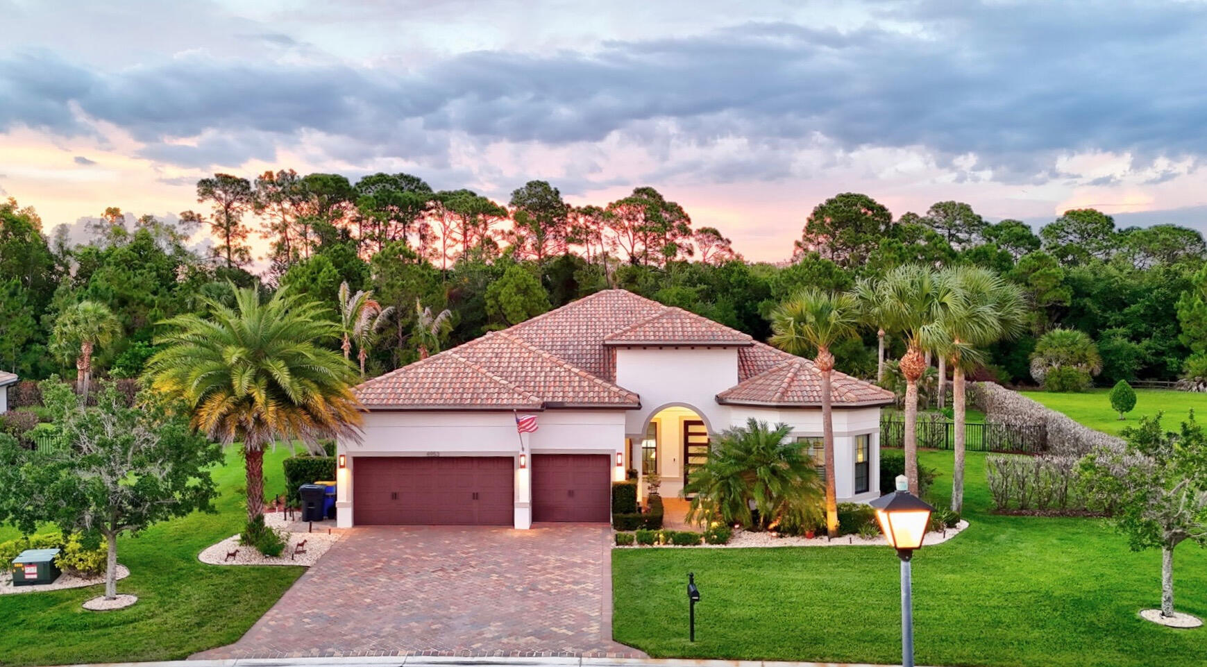 Stunning 3BR + office, 3BA, 3CG home in the Copperleaf community. Completely fenced and private backyard with resort-style swimming pool that has a sundeck with bubbler, spa, waterfall and gorgeous marble decking that continues on to the covered porch, which has a motorized retractable screen. Sliders fully pocket to seamlessly blend indoor/outdoor living. Inside, the open floor plan with generously-sized rooms and closets, beautiful quartz waterfall countertops, stainless appliances, high ceilings, and custom built-ins, exudes elegance. Whole-house water filtration. Impact windows and doors.  Located near A-rated schools, quick drive to Stuart shops, dining, and beaches  and close to I-95 & the Turnpike.Community features a clubhouse, tot lot, gym, pool, and tennis/pickle-ball courts.