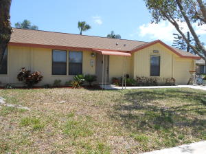 Move-in condition, shows like a model, huge back yard, room for a pool. Your family will love this home. New Roof, patio roof and screen in 2006. Newer appliances. Tiles in living area and second bedroom has gorgeous wood floors. Owner pays $2,600/year for insurance, this includes separate cover for the screened patio. Seller would like to remove wood house in back yard. Association fee is $135 2x per year.