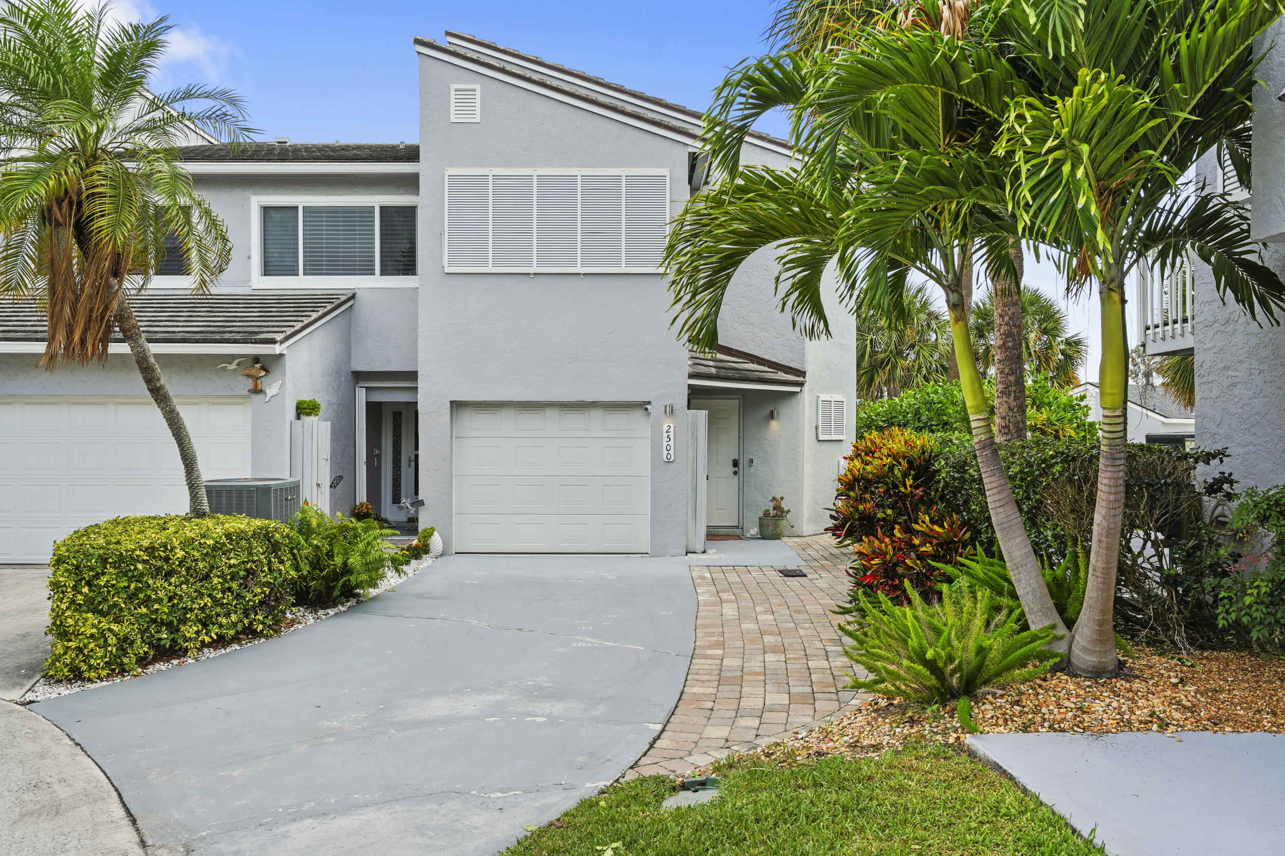 Welcome to 2500 Harbour Cove Dr, a waterfront end-unit townhouse on Hutchinson Island offering 3 bedrooms, 2.5 baths, and approximately 1,780 sq ft of living space. This light-filled residence features an open-concept layout with generous living and dining areas, water views from both levels, and a spacious back deck overlooking the canal. Enjoy your private deck with rear walkway access to your very own 30 boat slip with a 10,000 lb boat lift, an excellent setup for boating and waterfront living. Recent updates include a 2021 water heater and 2020 HVAC system. The property also includes a single-car garage for parking and storage. Located near the beach, Fort Pierce Inlet State Park, dining, and community amenities, this townhome offers a great opportunity for a full-time residence, seaso nal retreat, or investment property. Schedule your private showing today and explore the potential of this Hutchinson Island waterfront property.