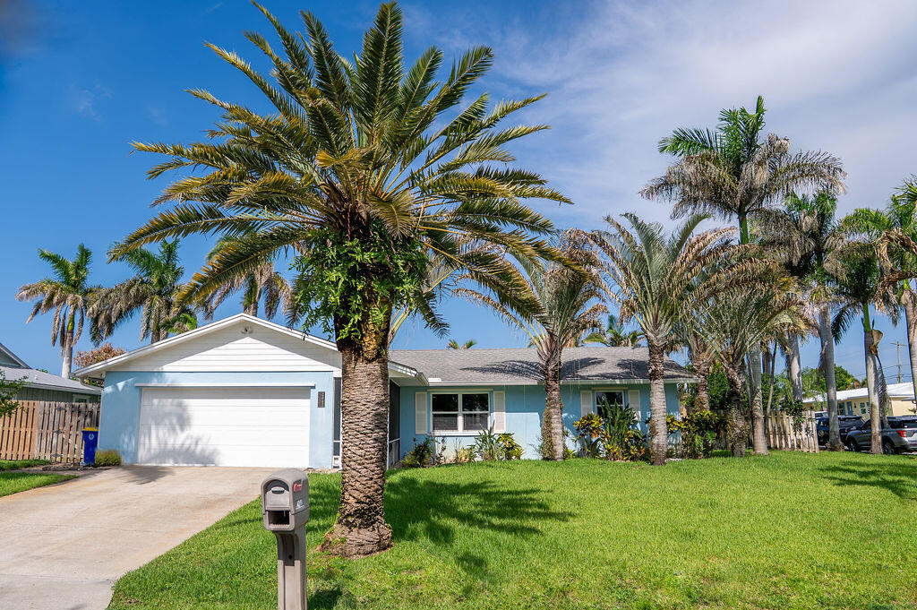 Welcome to this charming single-story residence in Leilani Heights, Jensen Beach, offering four bedrooms and two bathrooms within 1,302 square feet of comfortable living space. This thoughtfully designed home provides practical accommodation with a two-car garage for convenient vehicle storage and everyday functionality. The single-floor layout makes navigation throughout the home effortless, ideal for those seeking straightforward, accessible living arrangements. Located in the established Leilani Heights community, this property presents a solid opportunity for those seeking residential value in Jensen Beach.