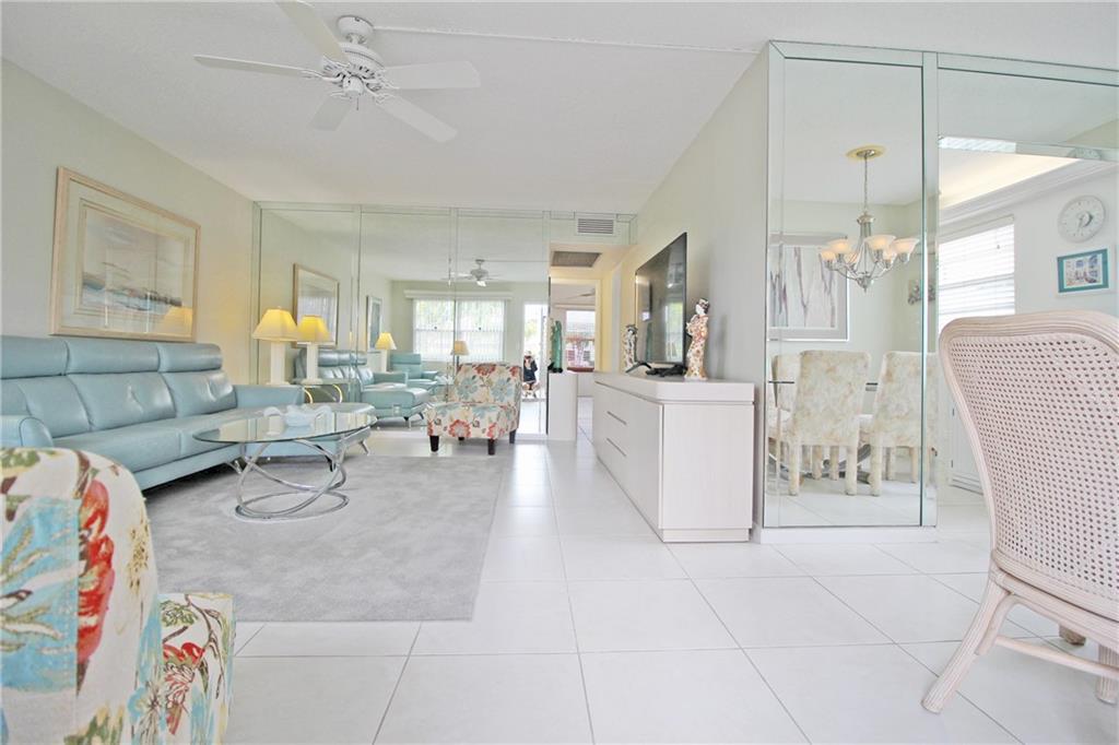 1ST FLOOR, CORNER & WATERVIEW!! WHO CAN ASK FOR MORE!! THIS 2 BEDROOM, 1.5 BATH WON'T LAST!! BRIGHT & AIRY WITH TILE THRU-OUT!! UPDATED KITCHEN WITH NO DOME! FULLY FURNISHED! BOTH BEDROOMS HAVE SLIDING GLASS DOORS TO THE ENCLOSED PATIO WITH A LOVELY CANAL VIEW!! PATIO FEATURES TILE FLOOR, EXIT DOOR & STORAGE CLOSET! CENTURY VILLAGE EAST IS A GATED COMMUNITY WITH FREE TRANSPORTATION INSIDE AND OUT!! THEIR LAVISH CLUBHOUSE FEATURES CLASSES, CLUBS, FREE MOVIES, BROADWAY SHOWS & STATE OF THE ART GYM!!  10 MINUTES TO THE OCEAN! CLOSE TO FABULOUS SHOPPING, MAJOR HWYS AND GREAT RESTAURANTS!  ASSOC. CLAIMS 55+.