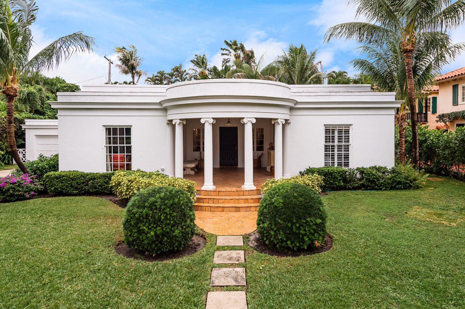 Located on one of Palm Beach's highly coveted ''Sea Streets,'' this charming one-story 4-bedroom, 4-bath residence offers the perfect in-town lifestyle just steps from the Lake Trail, Palm Beach Recreation Center, the Society of the Four Arts, and even offers beach access. Designed in a timeless Neoclassical Revival style, the home features classic architectural details, including elegant columns, high ceilings, and beautifully preserved original elements. Living spaces are complemented by large closet spaces, a convenient laundry room just off the kitchen, and a one-car garage. Situated on a quiet cul-de-sac in an exceptionally desirable location, this property is a rare opportunity to own in-town on one of Palm Beach's most sought-after streets.
