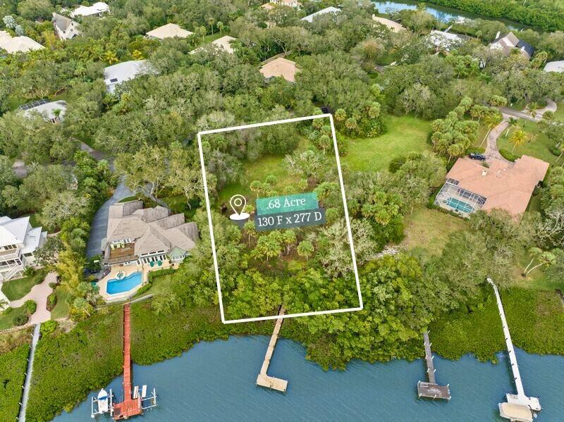Envision mornings with sunrises over the river, afternoons spent boating or paddleboarding from your private dock, and evenings framed by glowing sunsets and gentle breezes. 

For the discerning buyer seeking exclusivity, ease, and beauty, this .68 riverfront parcel crowns your Florida dream. This direct riverfront homesite is nestled on a serene cul-de-sac within the prestigious, gated Orchid Isle Estates, a highly sought-after community in Vero Beach. Enjoy two observation towers where residents can watch birds, space launches, and manatees play in the calm waters of the Indian River Lagoon.