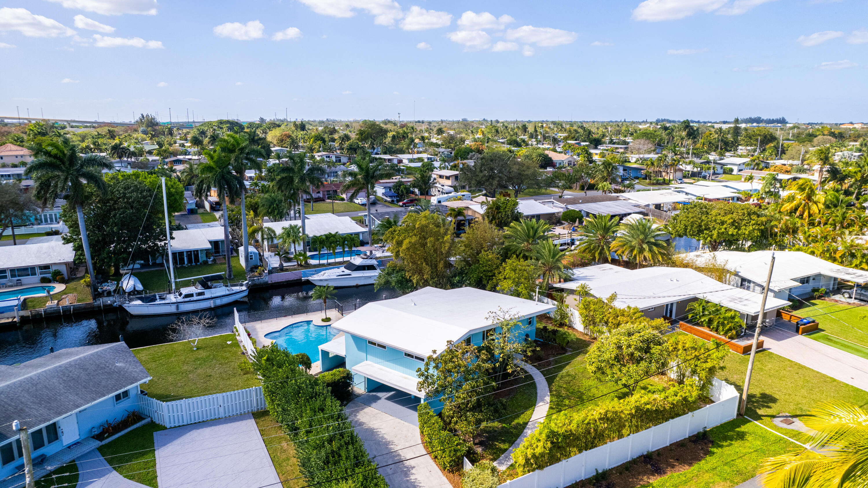 Welcome to your dream waterfront oasis in Fort Lauderdale! This stunning property offers the perfect blend of luxury, convenience, and coastal living.Located in the coveted Fort Lauderdale area, this home boasts sailboat ocean access, allowing you to explore the beautiful waterways of South Florida with ease.Oversized lot with 100 feet of waterfront Original terrazzo floors in main living area Restored solid oak floors upstairs A/C under maintenance contract Impact windows in main living area New pool deck and pool surface. Privacy fenced-in yard Fruit trees: mango, two avocados, starfruit Two-car carport