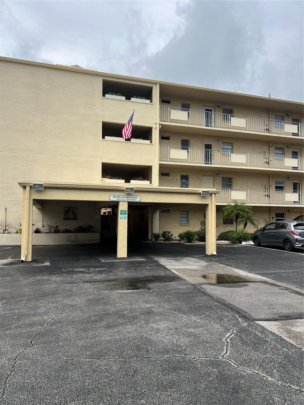 Gorgeous condo 3 miles from the beach!  NEW PRICE $120,000. Second floor condo with garden view from the kitchen and the living room. THE SELLER WILL PAY THE CONDO FEES FOR 12 MONTHS. Beautiful white kitchen cabinets and granite counter top. New stove, fridge. The property is all tiled with generous size enclosed balcony facing the garden. Good size walking closet and master bedroom with king size bed. Plantations shutters and hurricane impact windows. Master bathroom has impeccable walk in shower with frameless glass and new vanity. Half bath has a new vanity too. New electric panel. Plenty of storage. The laundry room is very close. Building has elevator. Water, internet and cable tv included in the HOA. Incredible gym, jacuzzi, bbq, pool, bocce and much more! Bring your buyer.