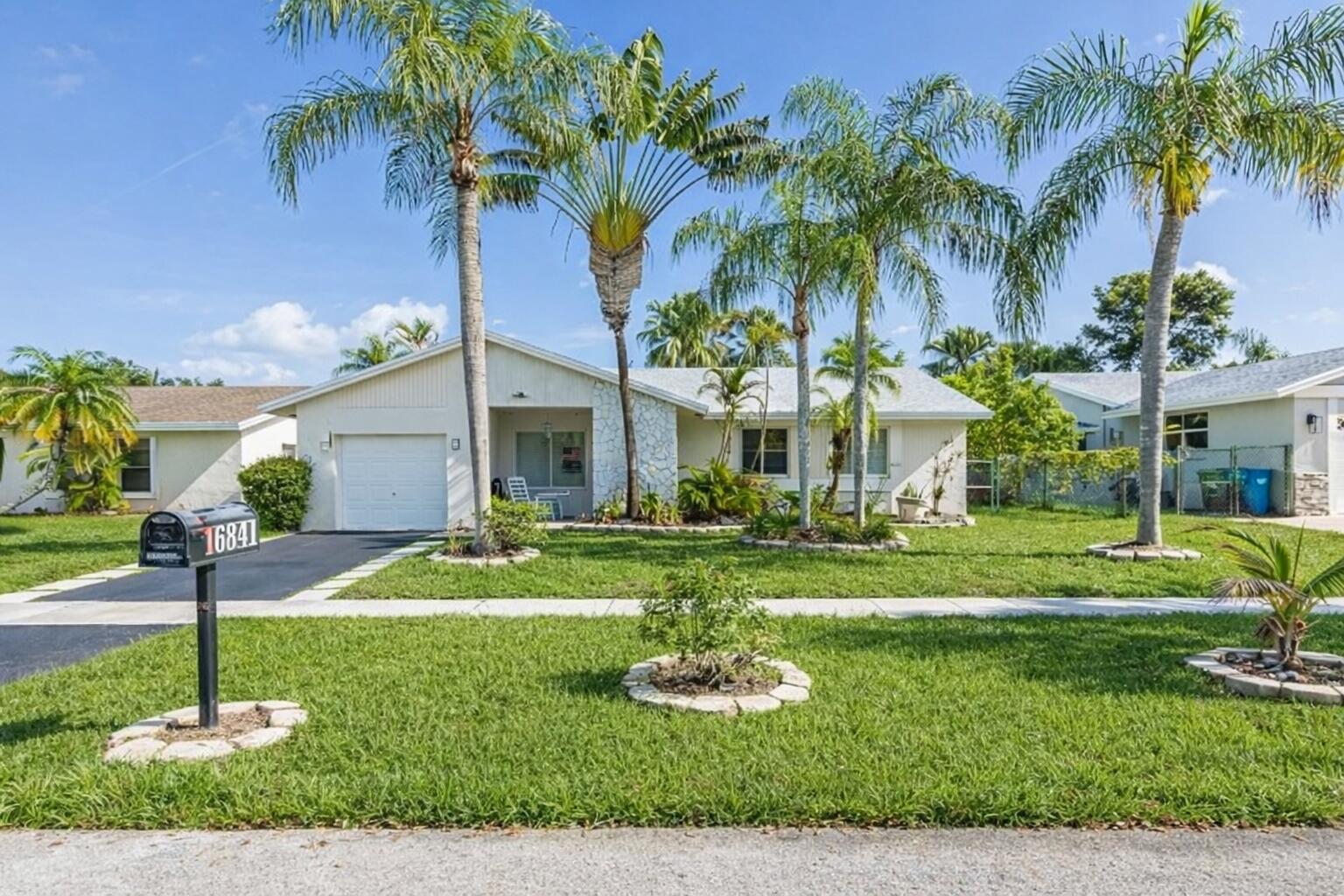 Motivated Seller!! Come see this beautiful 3 bedroom 2 bath  home i located in Weston.The home has impact windows & doors, a newer roof (2023), water heater (2022), & A/C (2018). It has new carpet in the bedrooms. Beautiful view of the amenities from your home. Conveniently located near top schools, parks, shopping and dining. Perfect for entertaining with oversized backyard and patio.  Low HOA fees $275 annually plus 420 a year for the Bonaventure town center amenities which includes, pools, fitness center, racquet ball and much more.