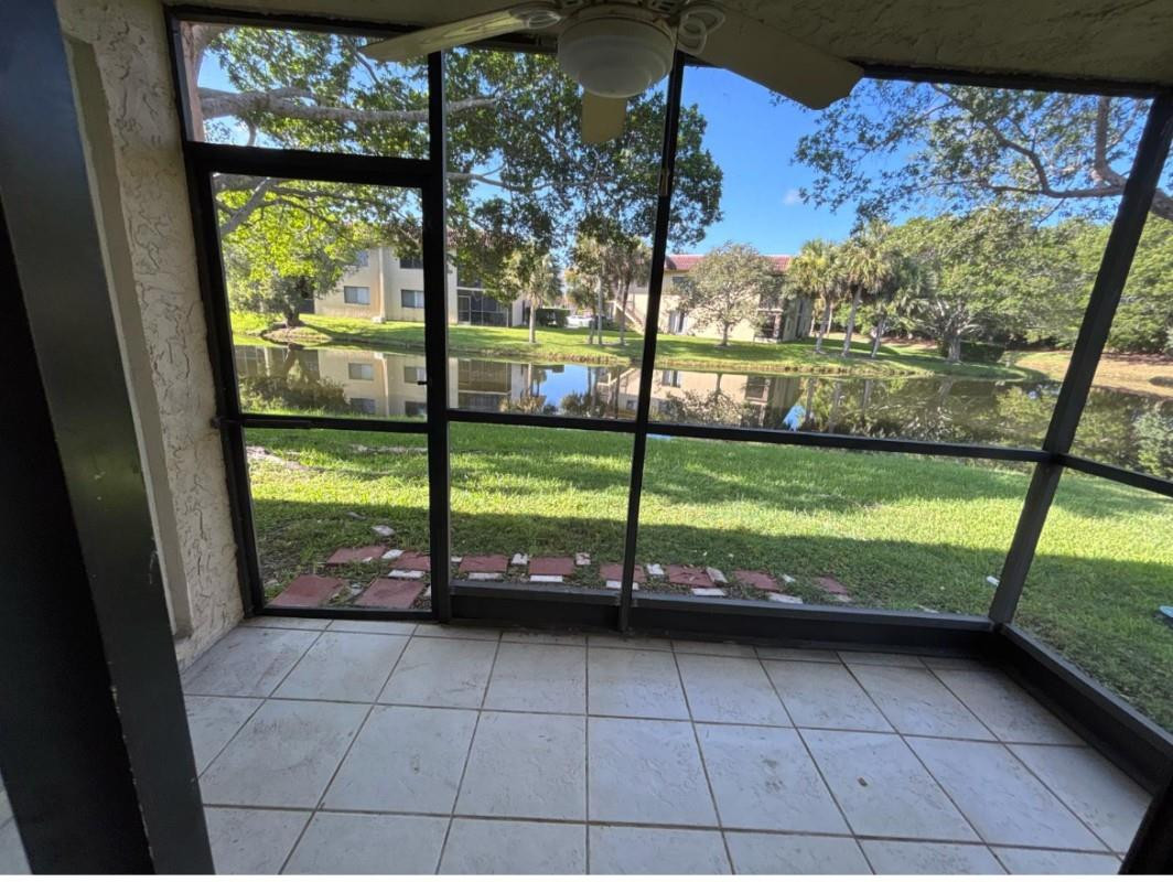 This 1st floor unit has been beautifully renovated and ready to move in.  Unit is a 2-bedroom, 2-bath condo in the desirable Racquet Club Apartments of Weston. This bright and spacious unit features an updated kitchen, and baths, durable vinyl flooring throughout, full size washer/ dryer, corner lot with back enclosed porch and water-view. Conveniently located near A+ schools, safe and secure environment with easy access to great shops and restaurants.