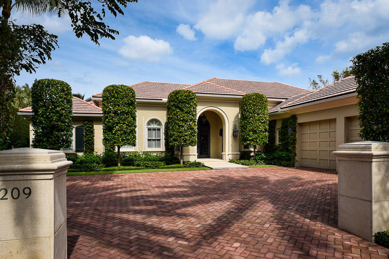 Nestled in the private Phipps Estates, this one story residence is situated on a beautiful lot.  The home was recently renovated wit beautiful architectural details and perfect proportions.  High hedges and lush landscaping give this estate a true Palm Beach feel.