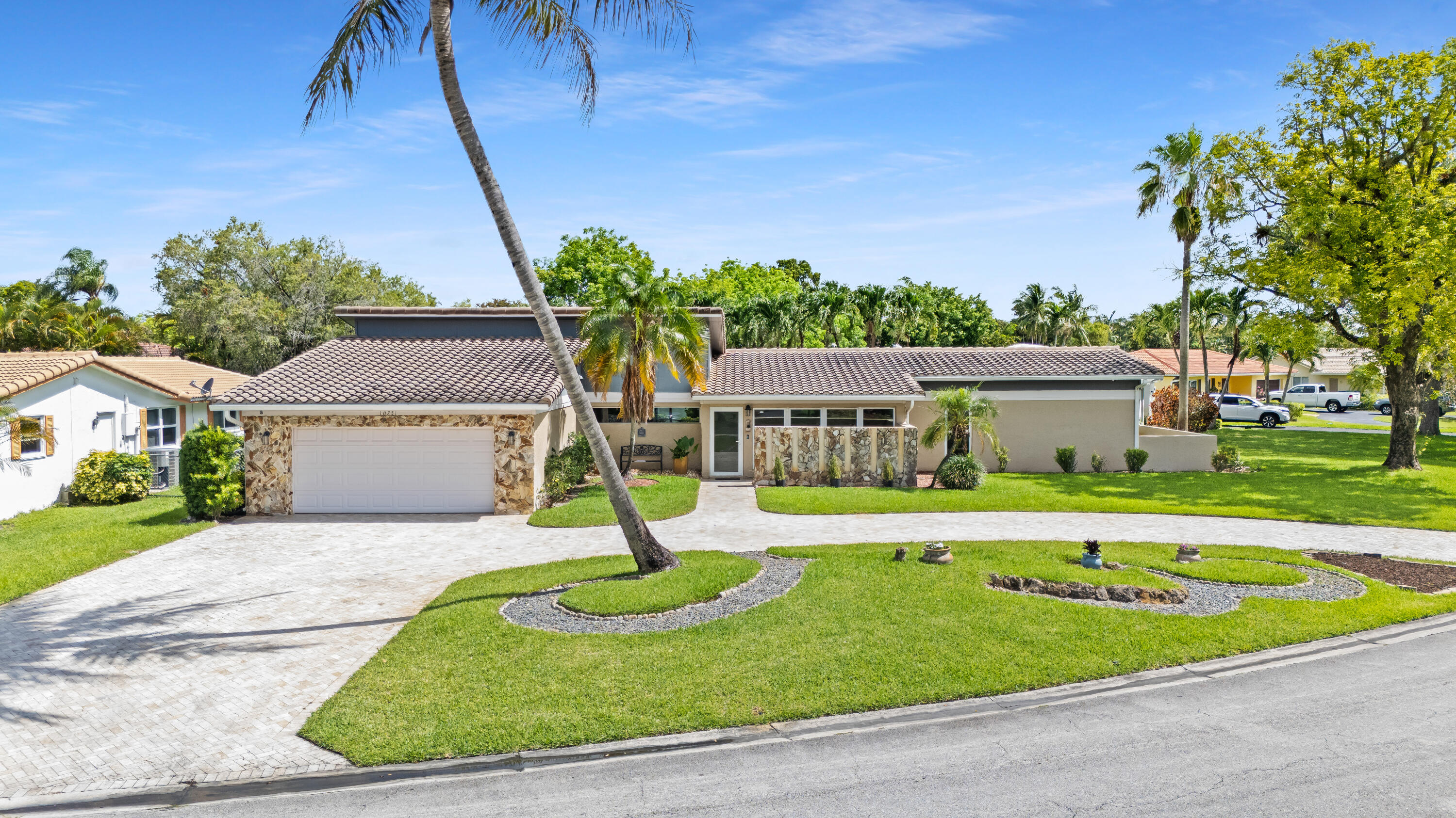 Beautifully updated single-story pool home in the heart of Coral Springs w/ NO HOA! Situated on over a ¼-acre lot! This 3BR/2.5BA home features a split floor plan, 2-car garage, office/flex space, separate laundry rm w/ storage, oversized circular paver driveway & patio. Beautifully maintained landscaping & manicured entry enhance curb appeal. Enjoy Florida outdoor living w/ a screened patio & private saltwater pool. Chef's kitchen includes quartz counters, smart fridge, double ovens, double dishwashers, pot filler, wine fridge, & SS appliances. Tile & laminate flooring throughout. Impact windows & doors in front & primary bath cabana door, shutters for glass sliders & back windows. Dual A/C systems, 2023 water heater, updated electrical panel, newer pool pump, & freshly painted interior. Beautifully updated single-story pool home in the heart of Coral Springs w/ NO HOA! Situated on over a ¼-acre lot! This 3BR/2.5BA home features a split floor plan, 2-car garage, office/flex space, separate laundry rm w/ storage, oversized circular paver driveway & patio. Beautifully maintained landscaping & manicured entry enhance curb appeal. Enjoy Florida outdoor living w/ a screened patio & private saltwater pool. Chef's kitchen includes quartz counters, smart fridge, double ovens, double dishwashers, pot filler, wine fridge, & SS appliances. Tile & laminate flooring throughout. Impact windows & doors in front & primary bath cabana door, shutters for glass sliders & back windows. Dual A/C systems, 2023 water heater, updated electrical panel, newer pool pump, & freshly painted interior.