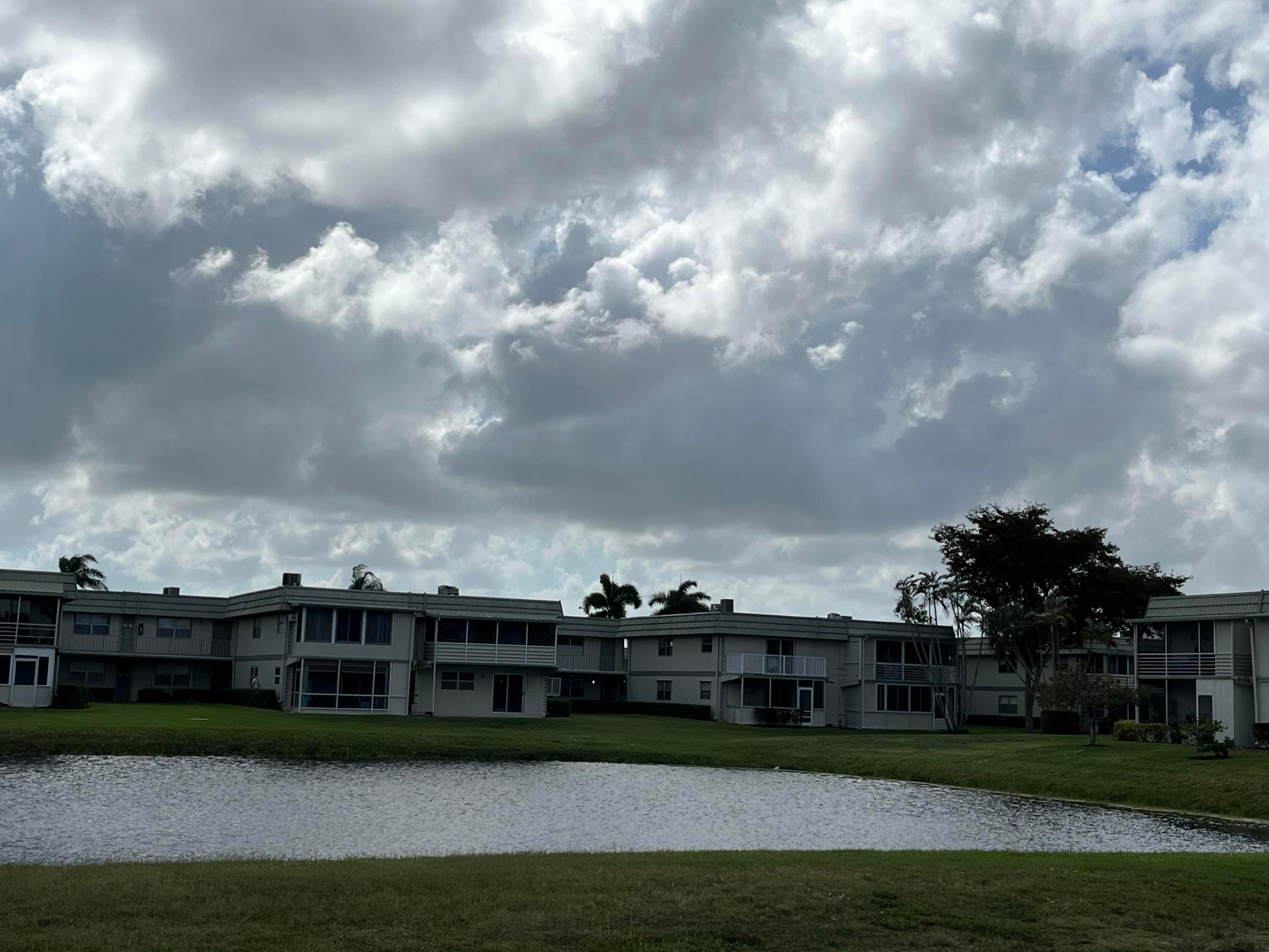Gorgeous ground floor 1/1.5 in the very private/tranquil, secluded area of Saxony 'A'.  Unit located on a canal waterview, overlooking a grassy area backyard and toward the Monaco C.H. pool area. This unit has been totally re-done, with open kitchen concept (wall removed) Extra kitchen storage capabilites. Patio contains an oversized stackable washer/dryer unit. Great location, great unit at a great price. Have your customer just bring their own furnishings.
