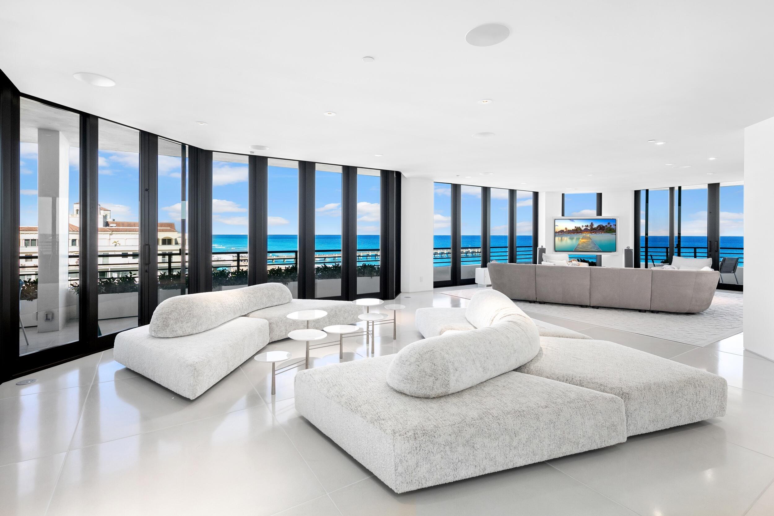Stunning and pristine 6 bedroom, 5.1 bath direct Oceanfront Penthouse designed by leading New York City designer, Sergio Mercado. Features clean lines, well-proportioned spaces, and breathtaking views of the Atlantic Ocean and the Intracoastal Waterway. Gracious open floor plan and an abundance of natural light throughout. With beautiful, custom finishes throughout, the unit exemplifies the highest standard of quality and attention to detail. Light and bright living room with spectacular marble wet bar connects to dining area and gourmet eat-in kitchen. Boffi kitchen cabinets, bathroom vanities, and bathroom fixtures. Frameless doors and pocket light details throughout. Beautiful Owner's suite with gorgeous bath, large dressing area, and stunning ocean views. Interior features include welcoming entry foyer, Control4 automated home system with in-ceiling Sonos sound system, Lutron electric shades, ample storage spaces, and in-unit laundry room. Expansive wraparound terrace is ideal for al-fresco dining and outdoor entertaining. Poolside cabana with powder room and wet bar opens to stunning resort style pool area.

The Hampton is a fantastic full-service building with 24/7 doorman and gatehouse, exercise room with sauna, seasonal pool and beach services on the weekends, dog walk, movie theater, 2 renovated tennis courts, beach access, and beautiful updated common areas including pool table and kitchen for entertaining. Additional highlights include 2 parking spaces ideally located immediately outside the main elevator, dedicated storage locker in basement, and garage bike storage.