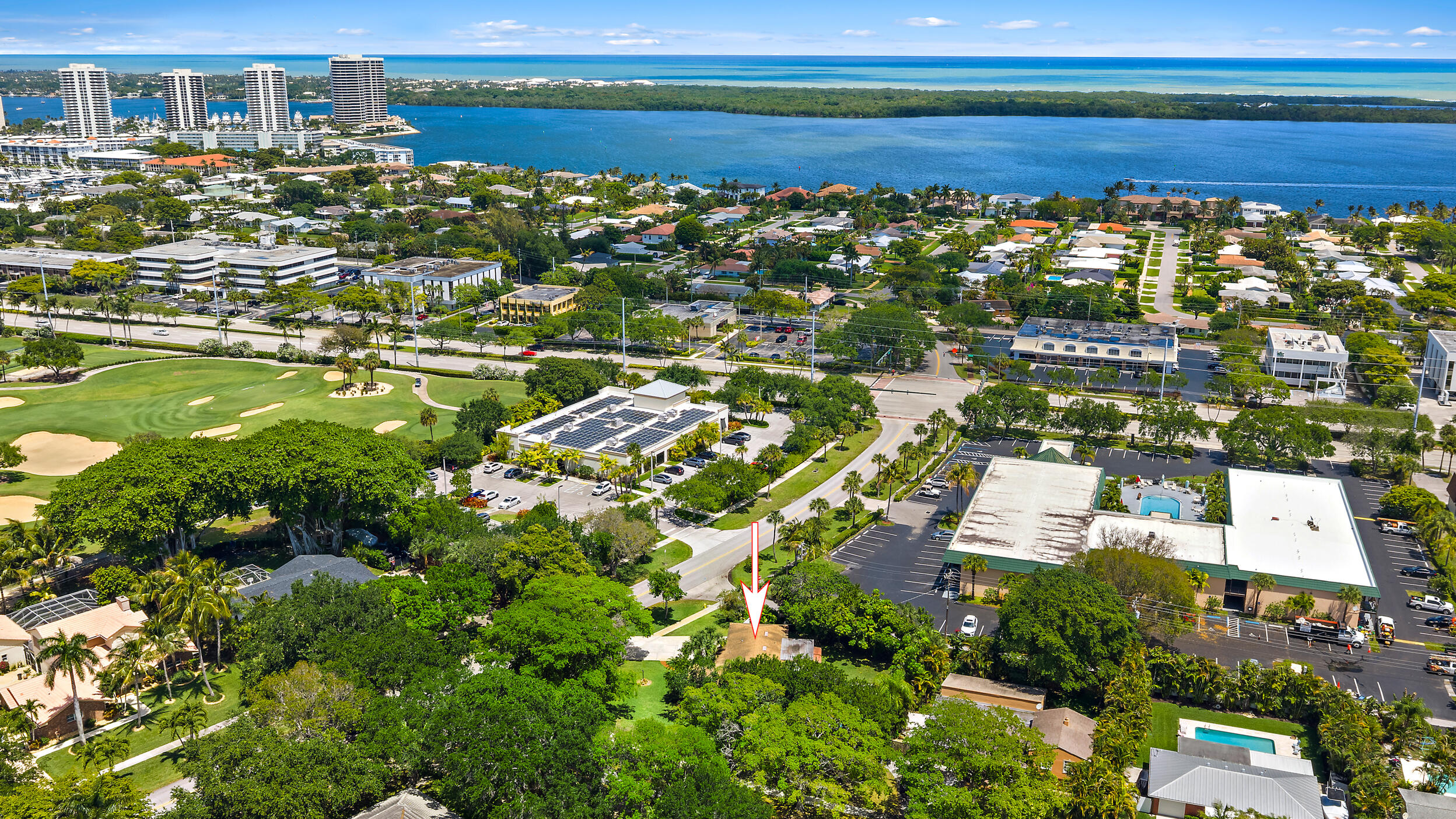 Prime opportunity in the heart of North Palm Beach. Set on an expansive 16,117 sq ft lot, this property offers exceptional potential for a custom estate or full renovation. Featuring a rare double-entry driveway and pool, the homesite offers flexibility for design, privacy, and curb appeal. Ideally located directly across from the newly renovated club, this is a true "cart-in, cart-out" setting—just moments to golf, tennis, and dining. Positioned at the corner of the course on the US-1 side, it delivers golf-course prestige without fairway exposure. A premier land value near beaches, dining, and shopping.