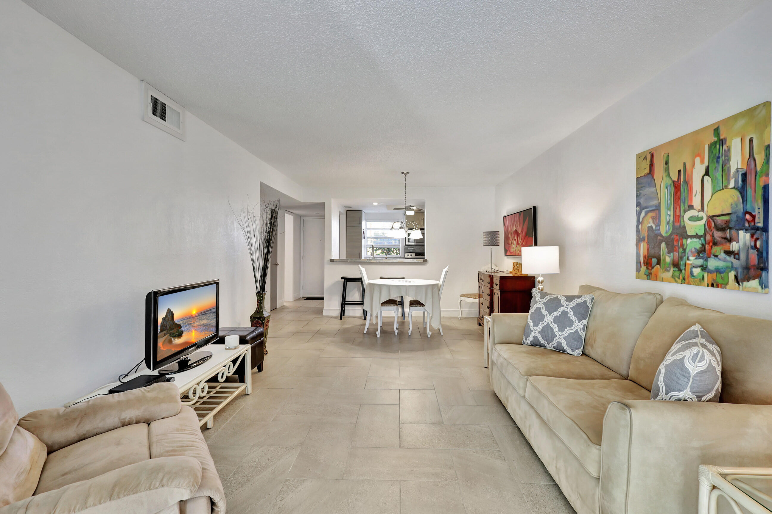 Welcome to this charming one-bedroom, one-and-a-half-bath condominium located in Village Royale Forest Green, Boynton Beach. Spanning 754 square feet of finished living space across four stories, this compact residence offers an efficient floor plan for those seeking a low-maintenance lifestyle. The thoughtful layout maximizes functionality within its modest footprint, making it an excellent choice for anyone looking to downsize without sacrificing comfort. Situated in the established Village Royale Forest Green community, this property provides convenient access to local amenities and services. This condo represents a practical investment opportunity for buyers prioritizing simplicity and ease of living. Village Royale Forest Green redefines 55+ community with an active, engaging, and socially connected lifestyle. Residents enjoy an active and engaging lifestyle with an impressive variety of amenities and activities. The complex offers swimming pool, fitness center, tennis court, billiards, club house, card games, or community events.   Conveniently located near shopping, dining, medical facilities, downtown Boynton  Beach, and beautiful South Florida beaches, this community offers the perfect blend of recreation, convenience, and carefree living.