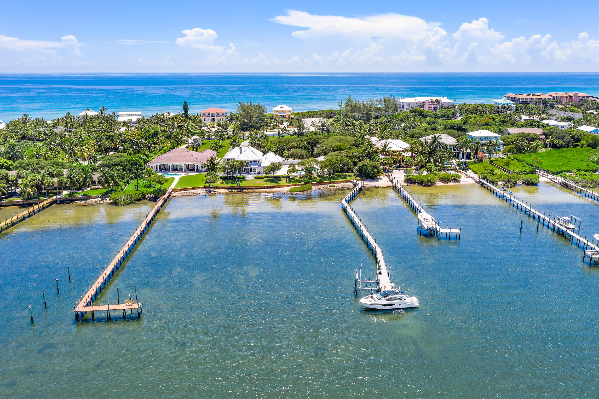 Welcome to IL Santuario (The Sanctuary), set on a 2.78 acre (double) intracoastal lot with ~5'-6' of deep water, ocean access and 235 feet of wide waterfront. The home has a desirable Open Floor Plan with a large Master Suite on the First Floor level, in addition to three other en-suite bedrooms on the second level. The interior of the home has been virtually staged/renovated and is ready for your own personal touches. The property features a Resort Style Pool with a Spa, Water Feature and even a Splash/Kiddie Pool! The newer dock features Trex Decking, water, electric and a 30K LB Quick Boat Lift. The property is located close to the Virginia Beach public access on South Hutchinson Island, just a short walk or 'golf cart' ride away. Be sure to watch the video for more details. The Island location is idyllic with miles of unspoiled sun-soaked beaches and a "close to everything" South Florida Location.