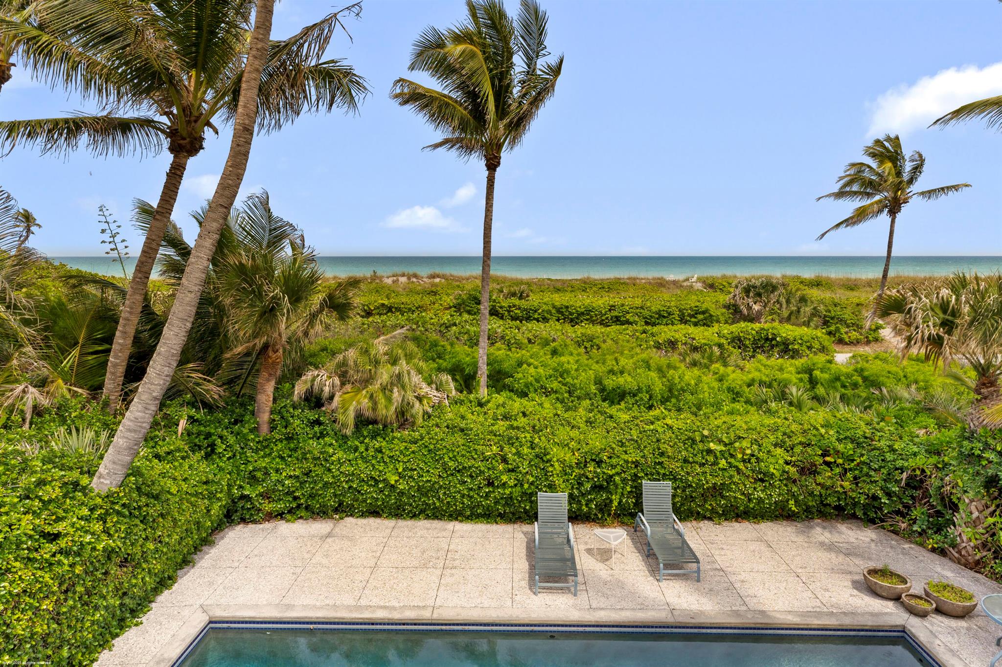 Enjoy breathtaking ocean views and delightful breezes from your Jupiter Island home!  Renovate or custom build your dream home on this North Beach Road lot.