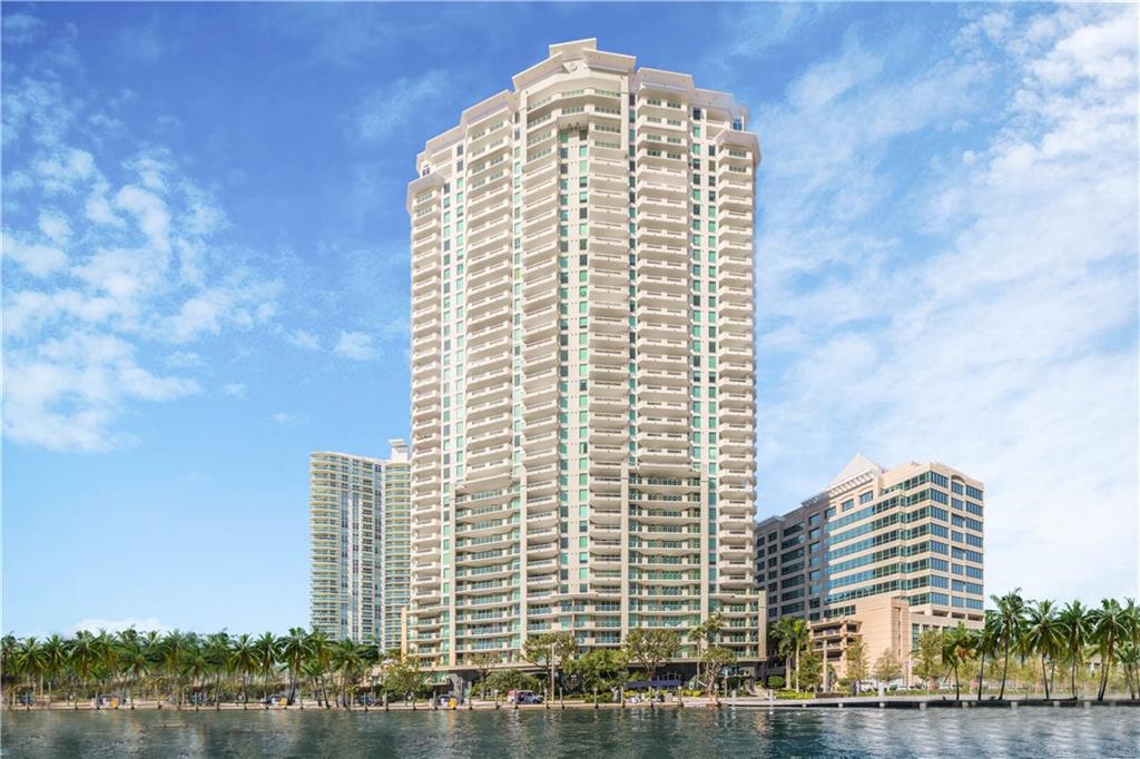 LARGEST ASHLEY UNIT IN THE BUILDING!  REMARKABLE DIRECT RIVER VIEWS! 3 BEDROOMS & 3.5 BATHROOMS PLUS DEN/OFFICE  UPGRADED FINISHES INCLUDING 18X36  POLISHED MARBLE FLOORS,  CROWN MOLDINGS & CUSTOM WINDOW TREATMENTS. LIVING ROOM LEADS TO A RIVERFRONT TERRACE FLOOR TO CEILING GLASS SLIDERS. GOURMET POGGENPOHL KITCHEN IS FITTED W/ GRANITE COUNTERTOPS, THERMADORE DOUBLE OVENS, SUBZERO REFRIGERATOR, MEILE DISHWASHER. MASTER SUITE FEATURES HIS & HERS CLOSETS, AN ENSUITE BATHROOM W/ MARBLE JACUZZI TUB, GLASS ENCLOSED SHOWER, MARBLE VANITY W/ DUAL SINKS.  SPACIOUS GUEST ROOMS & ENSUITE BATHS CREATES A PERSONAL SPACE FOR VISITORS. A GRAND EXPERIENCE W/ WORLD CLASS RESORT STYLED AMENITIES. SQUARE FOOTAGE IS APPROX.5 STAR RESORT STYLE AMENITIES.