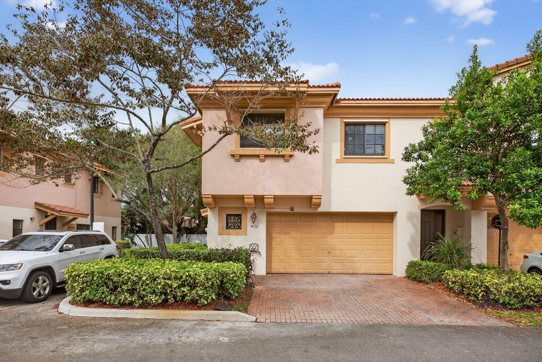 BACK ON THE MARKET! Previous contract fell through due to buyer's personal circumstances. Inquire for details. OPTION TO ASSUME SELLER'S 5.25% MORTGAGE! Rare opportunity to own a corner-unit townhome with a 2-car garage and low HOA in a quiet, tucked-away community of Grand Cypress. This 3-bedroom, 2.5-bath home features a brand-new water heater (2026) and newer A/C (2023). Corner units enjoy a full clay tile roof, unlike interior units with tar roofs. Bright and private with added corner-lot appeal. Conveniently located near major highways, shopping, dining, and entertainment. A strong combination of value and location!