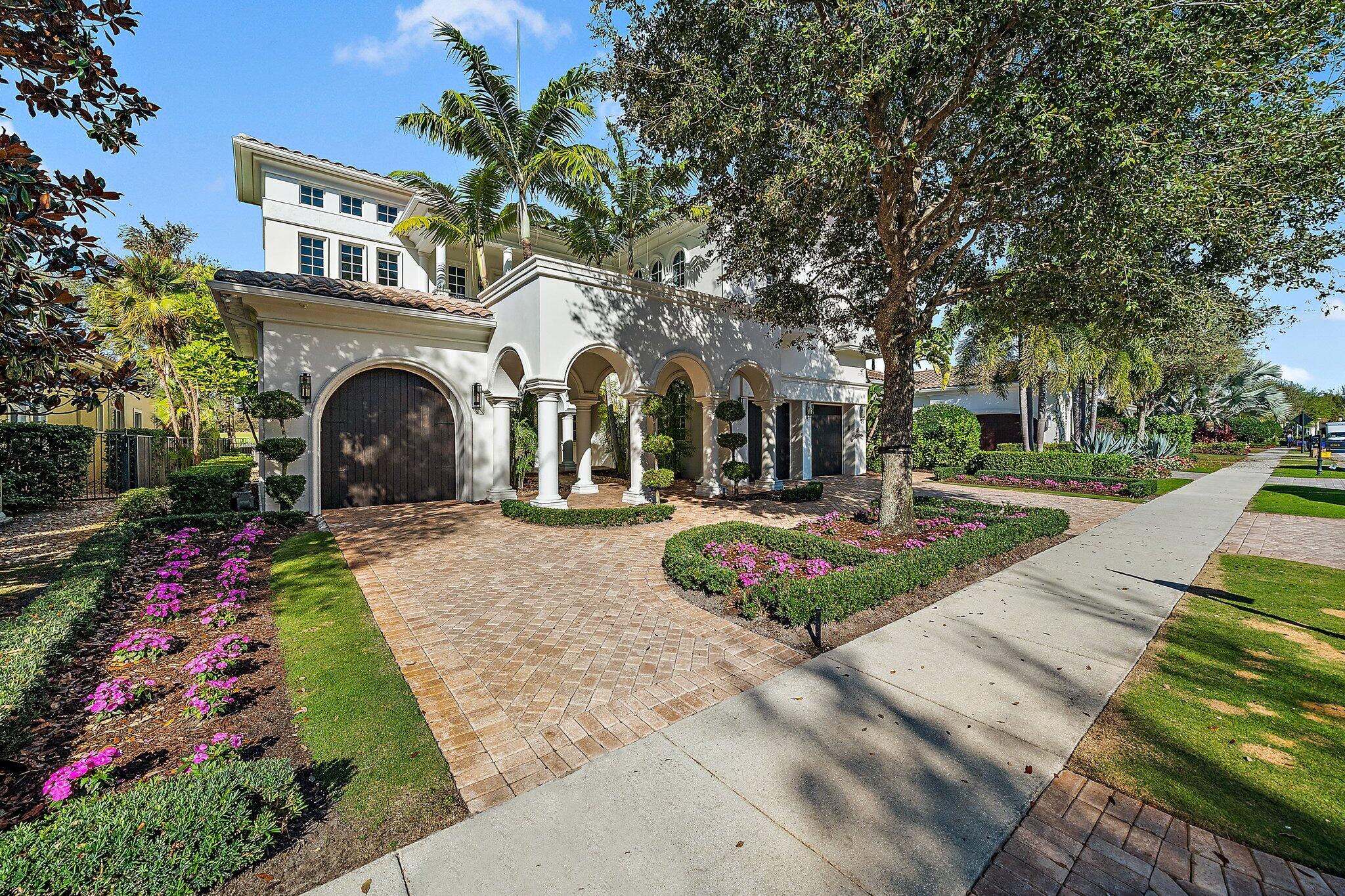 Tastefully updated Sarimento model in the gated, exclusive golf community of Old Palm. This comfortable floor plan features 4 bedrooms, an open kitchen, office, and multiple living areas. Largest model available in the golf estates section. Expansive owner's suite includes a private balcony, his and hers closets, and a generous bathroom. Airy and light, this home offers privacy and golf courses views of the third fairway of Old Palm's championship Raymond Floyd design golf course. Classic pool and spa package perfect for entertaining and relaxing in the South Florida climate. Value-add features include an elevator, 3-car garage, whole house generator, and wine room. Old Palm has cemented itself as the premier club in the area by continuously upgrading the member and resident experience.