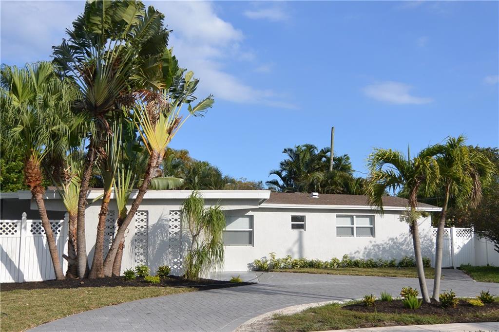 Great, quiet residential area, East of US1 hwy, 1 block North of Lighthouse Point this house was completely remodeled in 2016 - new roof, impact windows, floors, kitchen, bathrooms, HVAC. New electrical panel - 2021. 2022 - new driveway and patio cover installed, outside stucco redone. Space for a small pool in the backyard. 1,841 sq ft under air. Real wood kitchen cabinets, beautiful granite counters, enough space for all of your cooking gear. Split floor plan - master en-suite is in a separate wing from 2 other bedrooms. BONUS room - make it office, playroom, gym, den, extra bedroom. 14 minute bike ride to the beach and Deerfield Beach International Fishing Pier with all amazing 5-star restaurants and fun activities, including 9 beach volleyball courts.