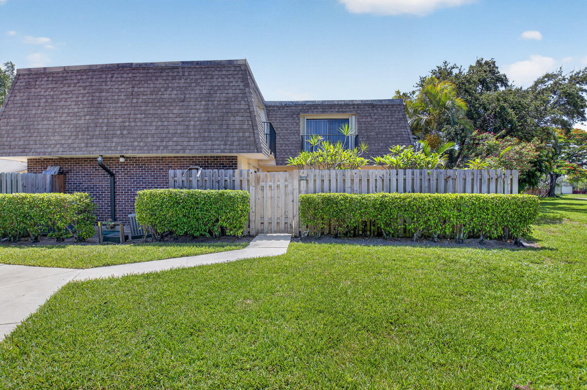 Welcome to this beautifully updated 2-bedroom, 2.5-bath townhome in the highly desirable community of Delray Oaks West. This move-in ready residence features a bright, open layout with full tile flooring throughout creating a clean, modern feel from top to bottom.  The home has been thoughtfully upgraded with a newer a/c system and water heater, offering comfort and efficiency for years to come. The interior has just been enhanced with the complete removal of popcorn ceilings and fresh paint throughout, giving the entire townhome a crisp, contemporary finish. The kitchen is tastefully updated with stylish cabinetry, stone countertops, and stainless steel appliances, while spacious living and dining areas open to a private outdoor space with garden—perfect for relaxing or entertaining.   Residents enjoy an array of amenities including a clubhouse, sparkling pool, fitness center, and tennis/pickleball courts, ideal for an active lifestyle.  Just minutes from all Delray Beach and Boca Raton have to offer including top dining and shopping. This home offers the perfect blend of comfort, convenience, and South Florida living. Residents enjoy an array of amenities including a clubhouse, sparkling pool, fitness center, and tennis/pickleball courts, ideal for an active lifestyle.   Just minutes from all Delray Beach and Boca Raton have to offer including top dining and shopping. This home offers the perfect blend of comfort, convenience, and South Florida living.