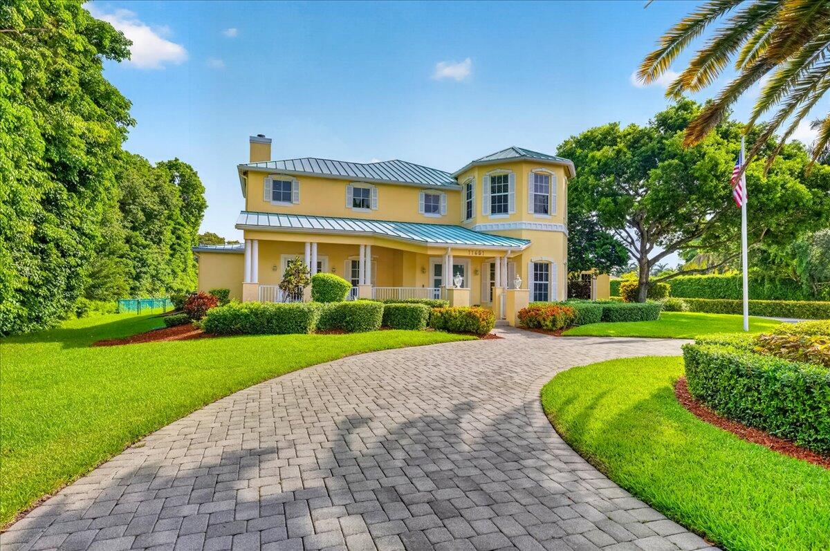 WELCOME HOME TO THIS IMPECCABLE ESTATE IN SOUGHT AFTER PLANTATION ACRES! JUST UNDER 6000 SF OF LIVING SPACE WITH AN OPEN LAYOUT, THIS HOME SHOWS PRIDE OF OWNERSHIP IN EVERY DETAIL. FOUR BEDROOMS, INCLUDING DUAL MASTER SUITES, FIVE FULL BATHS AND TWO EXPANSIVE BONUS ROOMS, PERFECT FOR AN OFFICE OR HOME GYM. THIS SPRAWLING YET SECLUDED PROPERTY INCLUDES JUST OVER AN ACRE OF PERFECTLY LANDSCAPED GROUNDS, A BEAUTIFUL OPEN VERANDA AND EXTRA LARGE PAVER DRIVEWAY. PERFECT FOR ENTERTAINING, THIS KEY WEST INSPIRED PROPERTY HAS AMPLE ROOM FOR EVEN YOUR LARGEST GATHERINGS. BRIGHT AND AIRY, THIS HOME BOASTS IMPACT WINDOWS AND A FULL SERVICE GENERATOR. LIMESTONE FIREPLACE, MARBLE FLOORING AND A KITCHEN THAT A CHEF WOULD LOVE. THE POOL INCLUDES A SPA AND FULL CABANA BATH. NO HOA AND PERFECT LOCATION.
