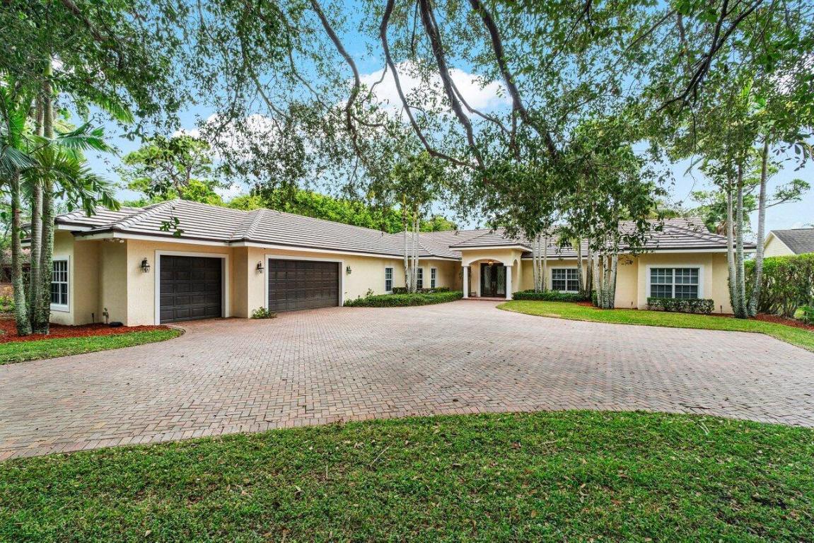 Experience Florida living at its finest in this stunning Riverfront Estate on the NW Fork of the Loxahatchee River in Jupiter, Martin County. Situated on over an acre with 100+ feet of riverfront and 474 feet of depth. This private retreat offers a new roof (2024), freshly painted interior, large bedrooms, Bonus room for entertaining, wood and porcelain floors, exposed beams in living room, custom moldings, and a glassed-in porch. The outdoor space features a large pool with a spa overlooking the spacious backyard and the Loxahatchee River, as well as a deck and Chickee hut, recently re-thatched. Enjoy ocean access from your private dock w/ 9,000 LB Lift, minutes to the Jupiter Inlet. Don't miss out on owning over an acre of Riverfront in sought after Jupiter!