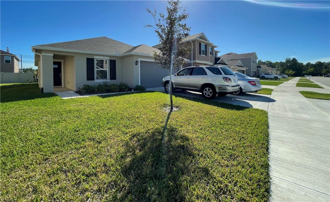 Built in 2020 and located in the St. James area of Port Saint Lucie, this 3 Bedroom / 2 Bath home features 1,366 sq. ft. of living space.  The open concept floor plan features volume ceilings in the great room and 17x17 tile throughout all living areas. The modern kitchen offers 42'' white wood cabinets, granite countertops and Whirlpool stainless steel appliances. Master bath includes a dual-sink vanity and an oversized walk-in shower. Enjoy evenings entertaining on the covered patio overlooking a generous backyard with privacy fence. Low Taxes and HOA