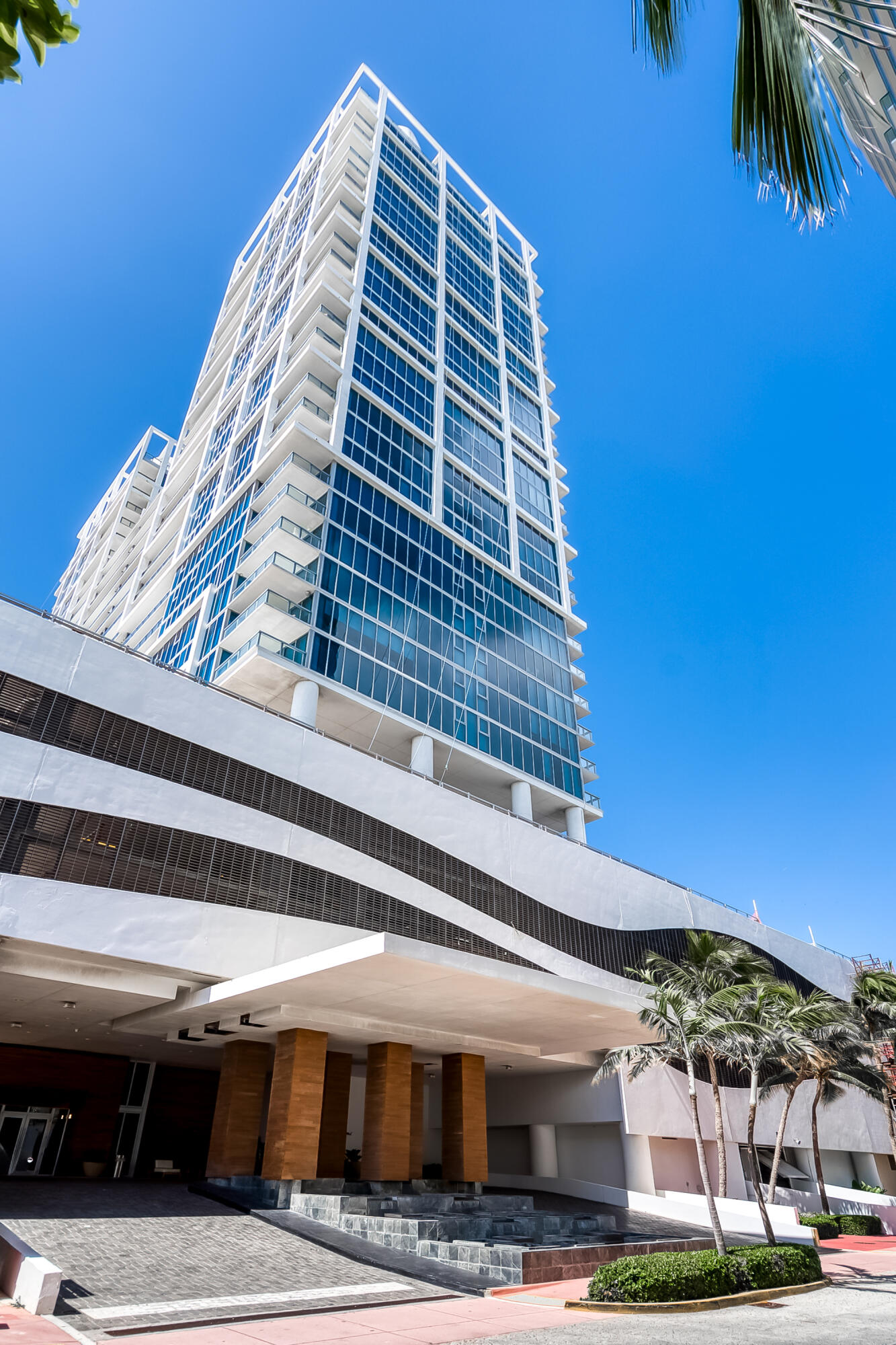 Welcome to the beautiful and exclusive North Tower Residence at Carillon Miami Beach - 1BD/1BA, 820 SF, terrace with  breathtaking sunset views. The unit is bathed in natural light through floor-to-ceiling glass windows. Washer and dryer inside unit. Ownership at Carillon includes full Beach Club and Wellness Center membership, granting access to 9+ oceanfront acres of amenities: a 70,000 SF spa and fitness center, four pools, private beach service, a Michelin-caliber dining program, juice and coffee bars, a rock-climbing wall, hydrotherapy, sauna and steam, and hundreds of weekly classes spanning Pilates, Zumba, ballet, barre, and Gyrotonics. Round-the-clock concierge and security complete the resort experience.  Just minutes from Bal Harbour Shops, the Design District, South Beach, and Miami's 13-mile oceanfront boardwalk, this is a rare chance to own in Miami Beach's premier wellness community. Schedule a showing today.