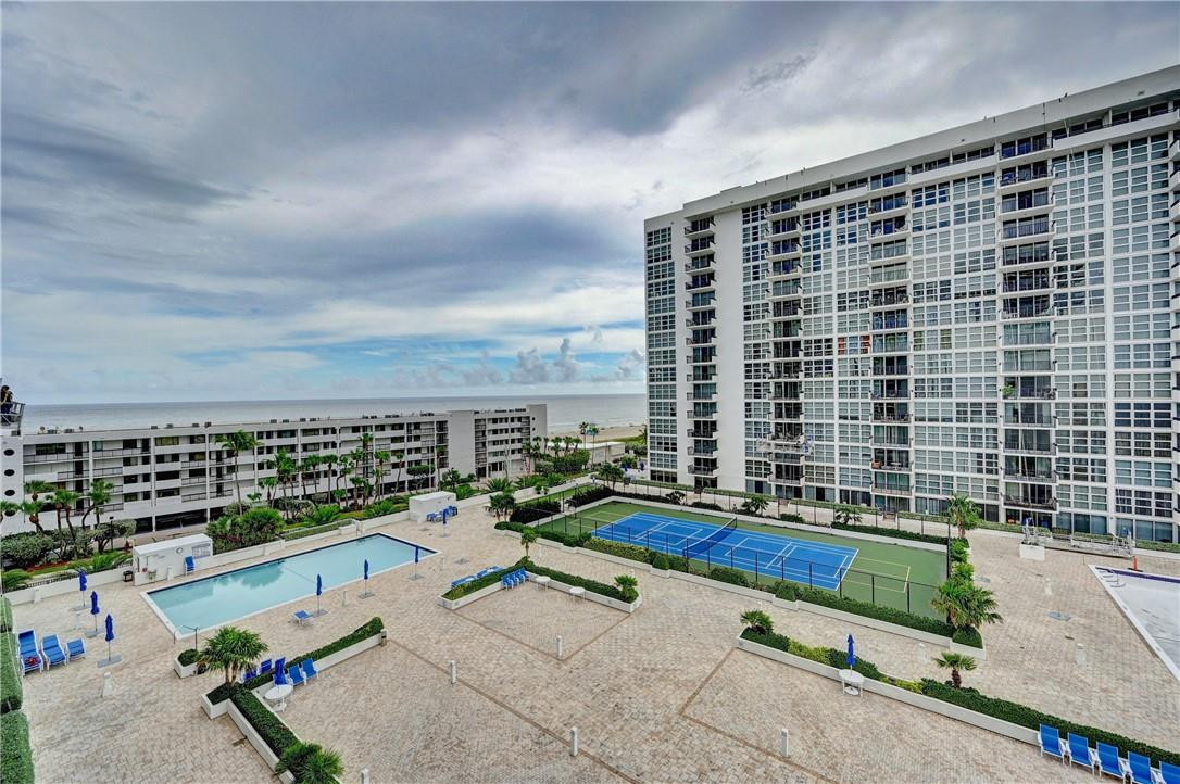 Welcome to your dream beachside oasis! This 2 bedroom, 2 bath unit has stunning ocean views and is nestled within a beautifully renovated building. Immerse yourself in the breathtaking coastal scenery from the comfort of your home, thanks to the floor-to-ceiling impact glass that showcases the panoramic views.  Located just a leisurely stroll away from the recently revitalized Pompano Beach pier, this prime property offers convenient access to an array of new restaurants and shops.  One of the outstanding features of this unit is the fantastic tenant who will occupy the space until mid-January. This means you can effortlessly collect rent and let your investment work for you until winter arrives. Once the season changes, you can take advantage of the unit and the full service amenities.
