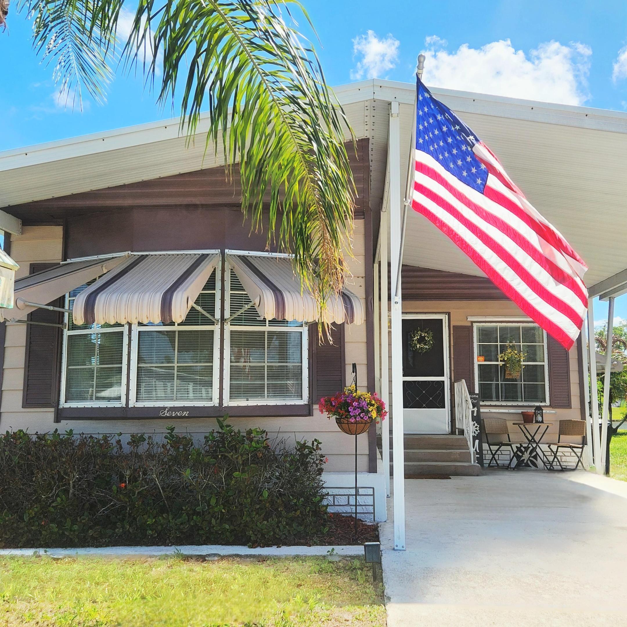 Spectacular views surround this 2bed/2bath home, nestled on a quiet street. Step inside & beauty continues in this 2024 FULLY REMODEL/UPGRADED abode including ROOF, HWH, Sub Flooring, Granite Counters, SS Appliances, Soft Close Drawers, Bathrooms, ExtraStorage, Outlets Replaced, Complete Shutters & More! Watch ducks & wildlife glide by & colorful evening sunsets in the window/screened in Patio. Large sized lot offering privacy & space great for pets, gardening, grilling, entertaining. PRIME LOCATION;near beach, grocery stores, postal, banks, hospital, pharmacy & more! Lot rent of 1015.27 incl. trash, lawn, private free golf course, heated pool, fitness, pickleball/tennis, shuffleboard, bocce, gym, library, card games, MahJong, Bible study, workshop, parades, dinners, dances, trips & more!
