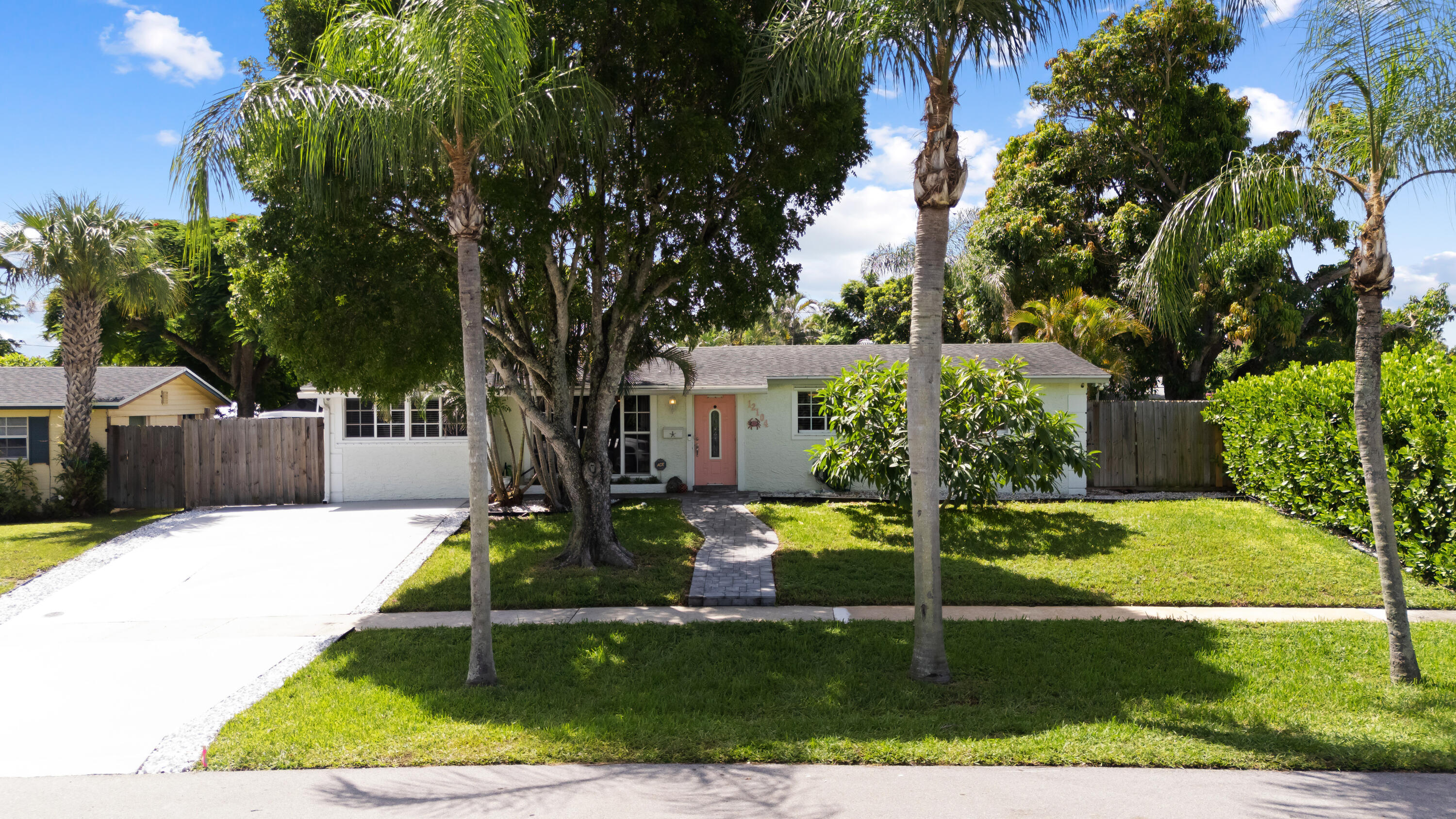 Beautifully maintained, turnkey 4-bedroom, 2-bathroom pool home offering comfort, style, and functionality. The updated kitchen opens to a spacious family room overlooking the private backyard and sparkling pool, while the inside utility room and tile and laminate flooring add everyday convenience.  Step outside to your own backyard oasis featuring a large entertaining area, fire pit, a fully fenced yard, and a 15' x 30' pool. Additional highlights include newer windows, an upgraded electrical panel, a security system with cameras, well-fed irrigation, and gated parking with room for a boat or trailer up to 30 feet.